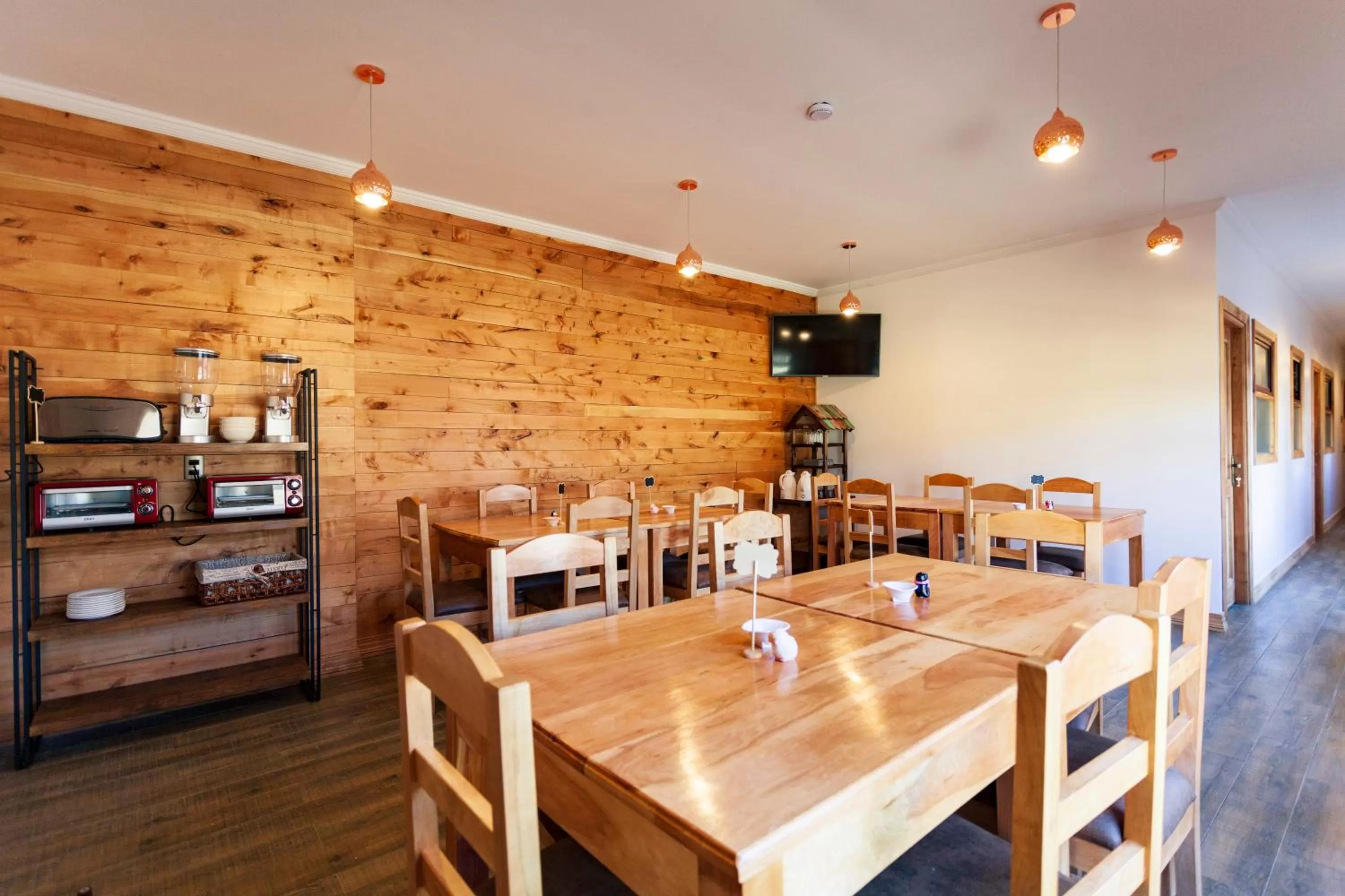 Communal lounge/ TV room in Hostal Boutique Patagonia Mística