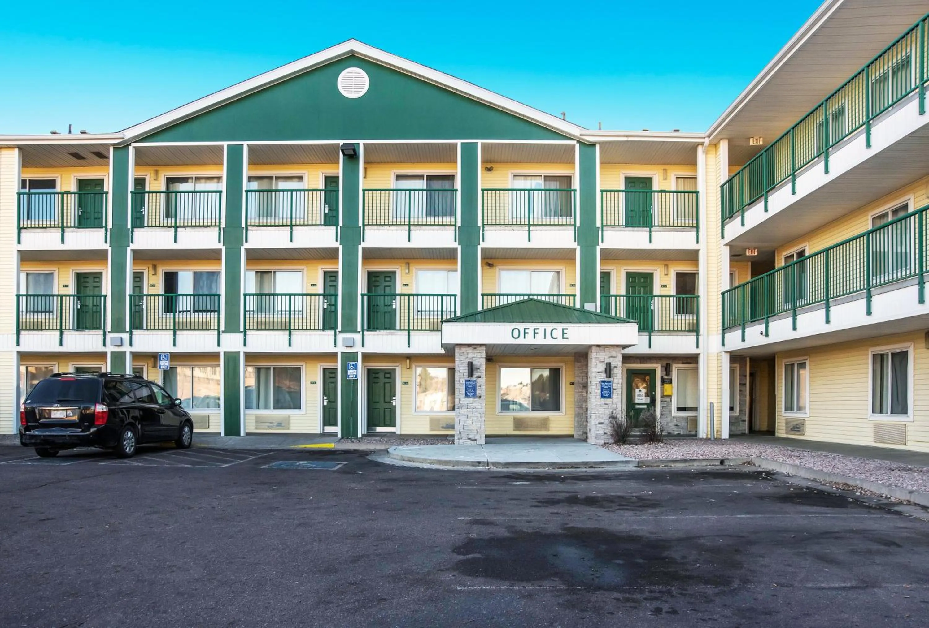 Property building in HomeTowne Studios by Red Roof Colorado Springs - Airport