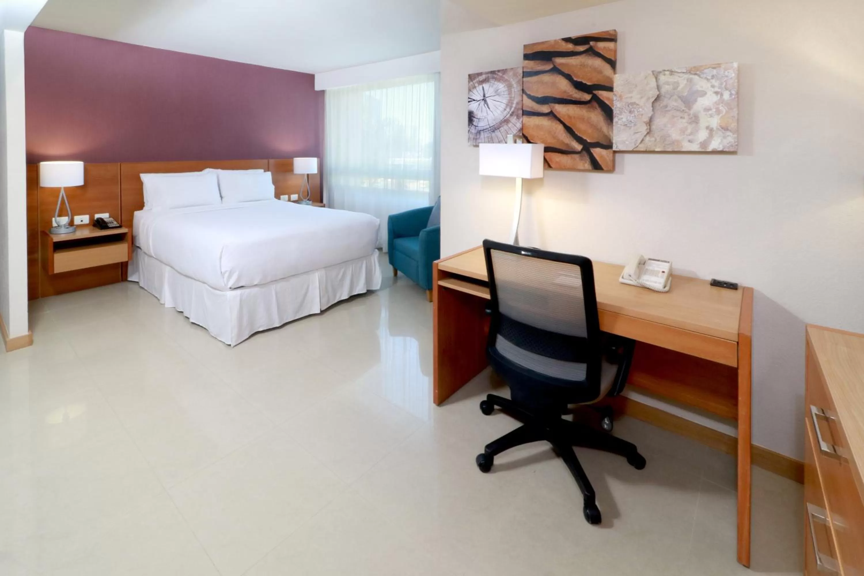 Photo of the whole room, Bed in Staybridge Suites Guadalajara Expo by IHG