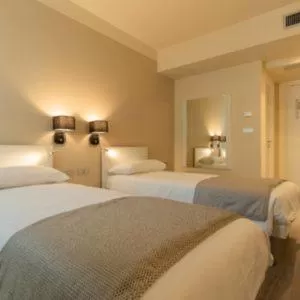 Bed in La Dolce Vita Hotel