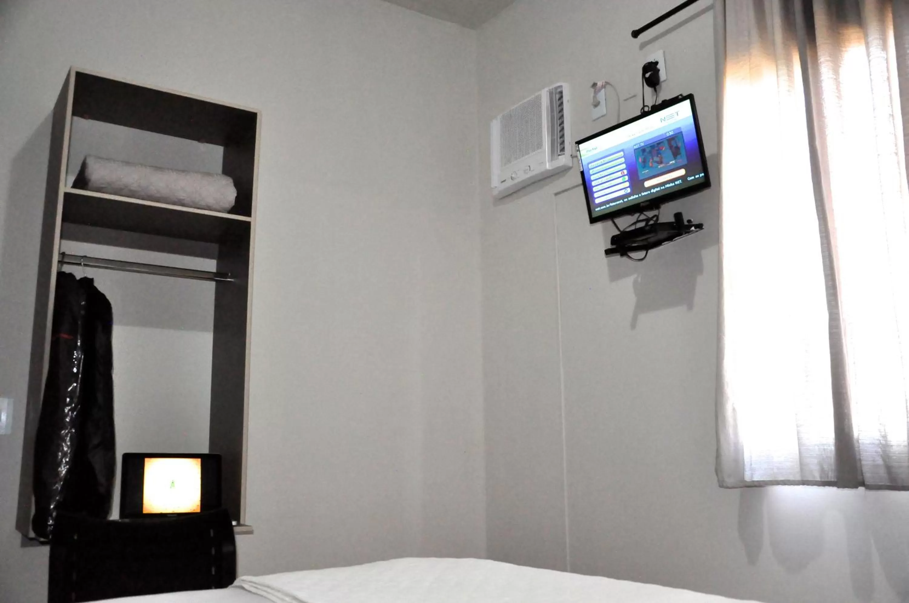 Bed in Hotel Caçula