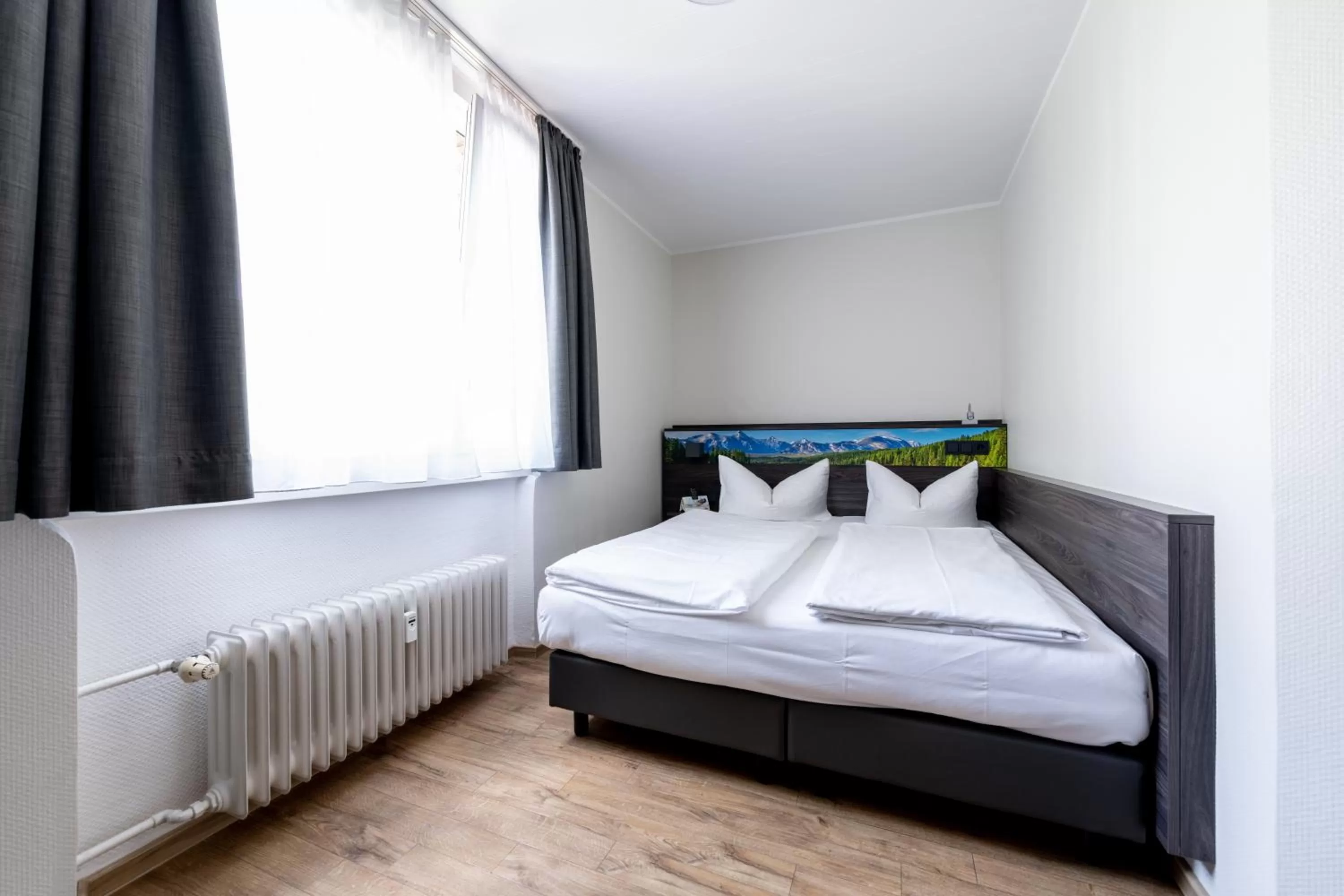 Bed in Art Hotel Aachen