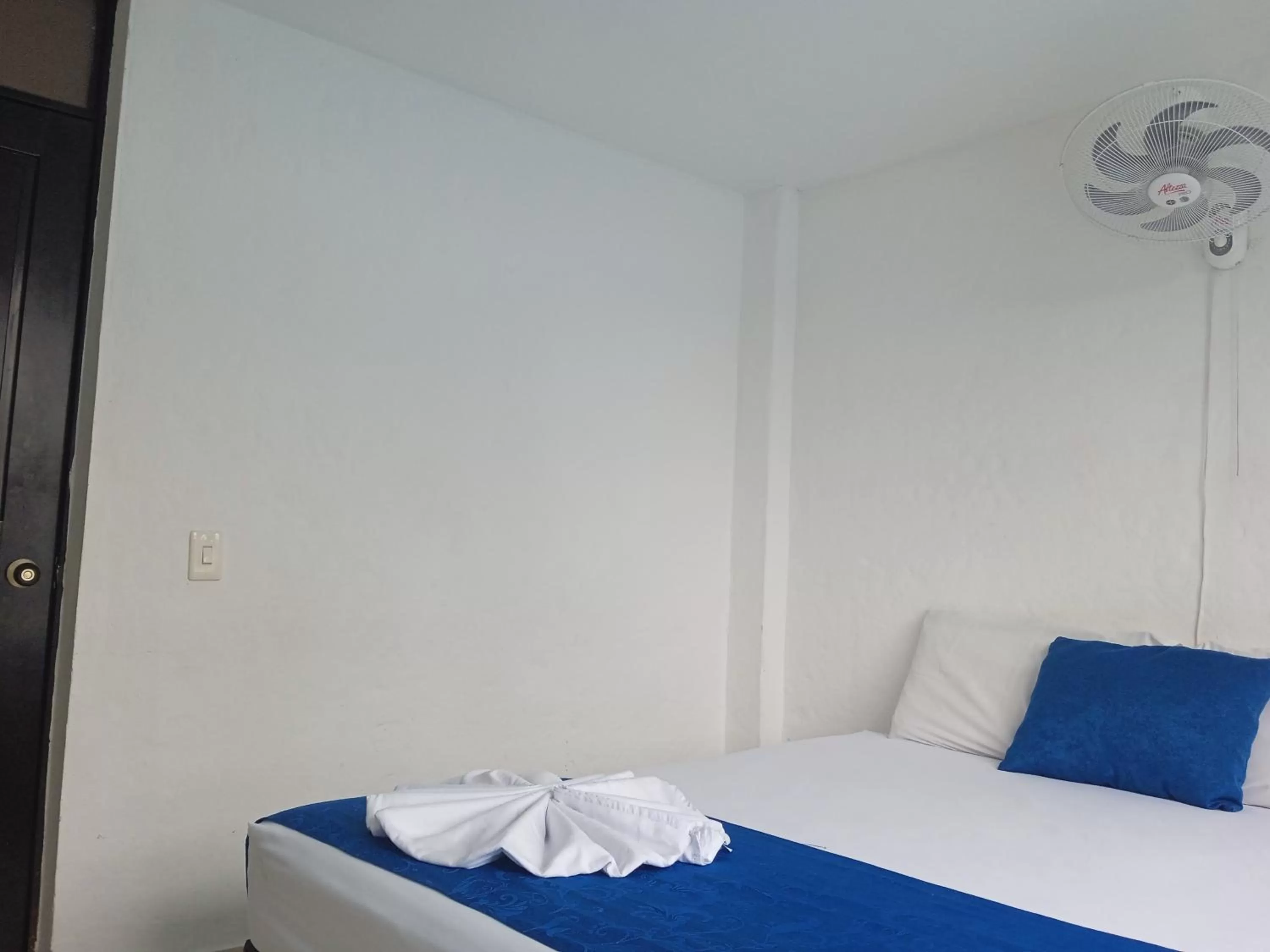 Bed in Blue Star Hotel