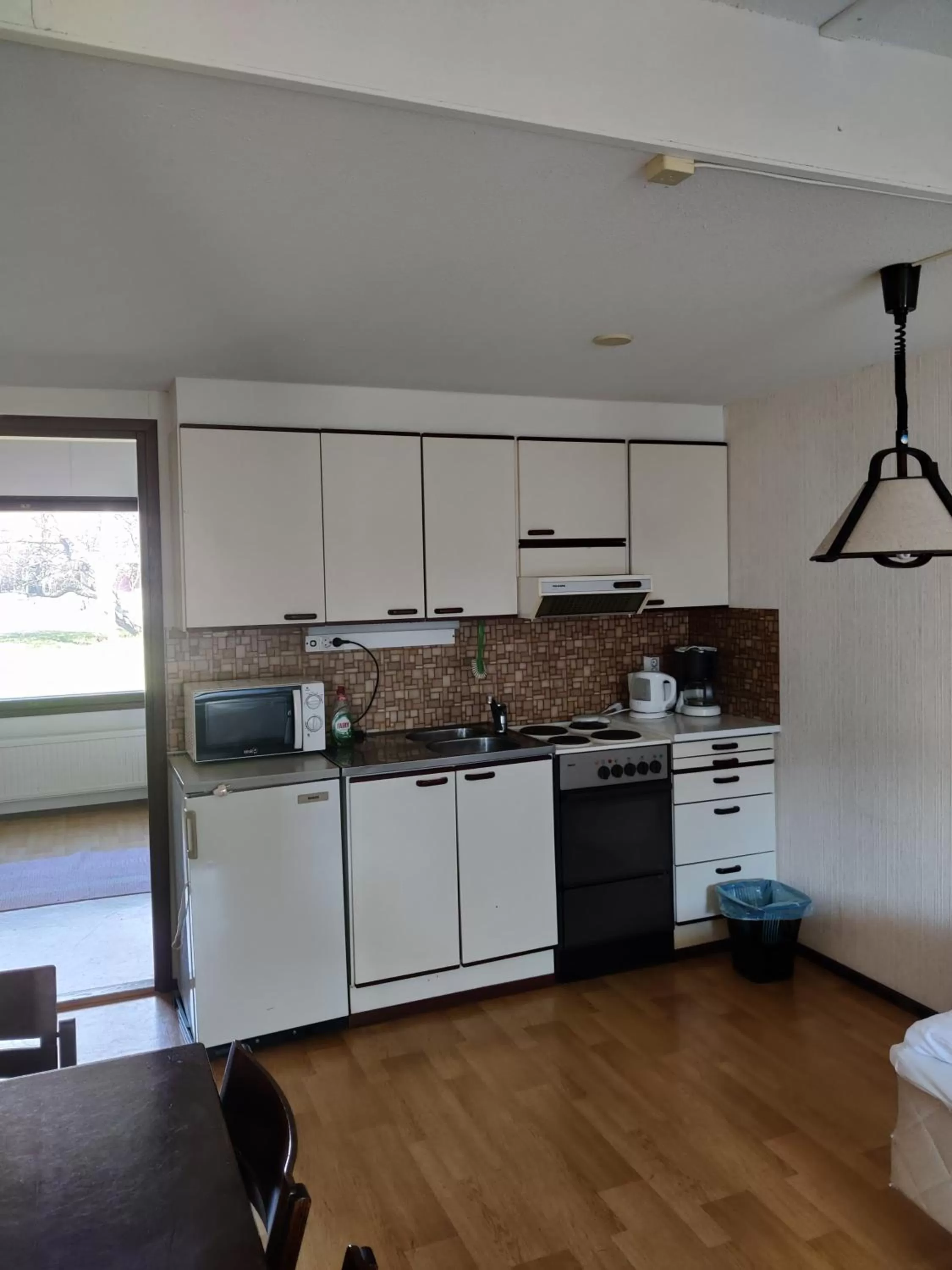 Kitchen or kitchenette in Budget Hotel Raahe