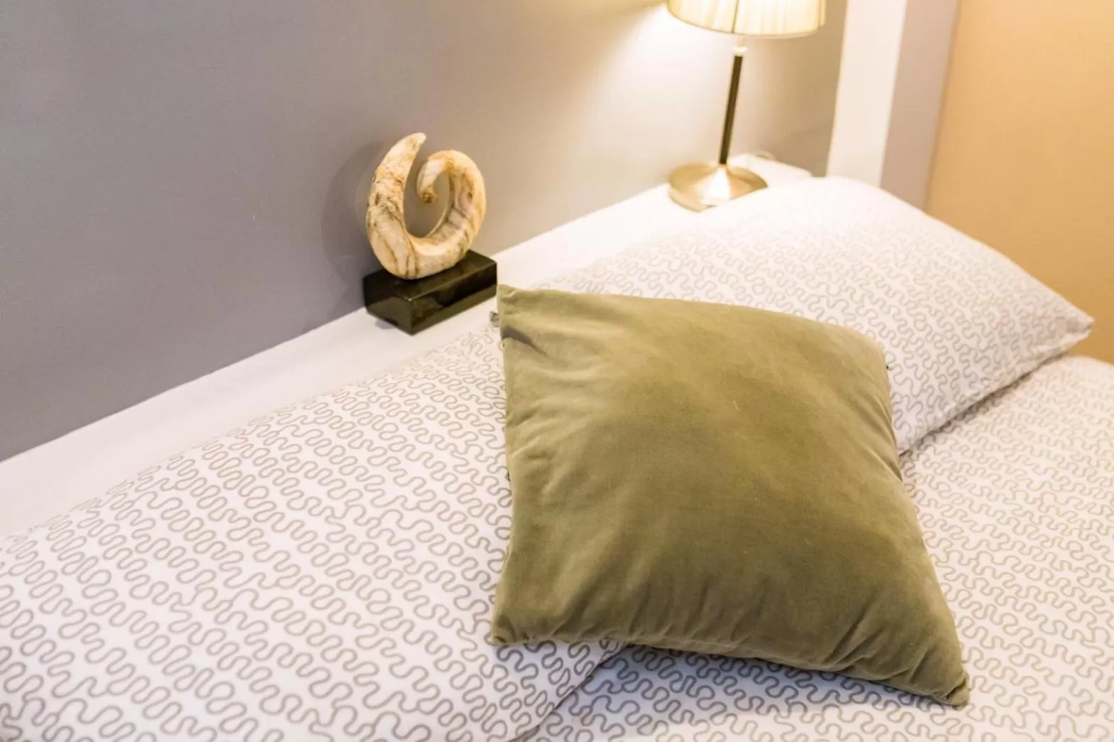 Bed in THE BEACH CHA AM Residence