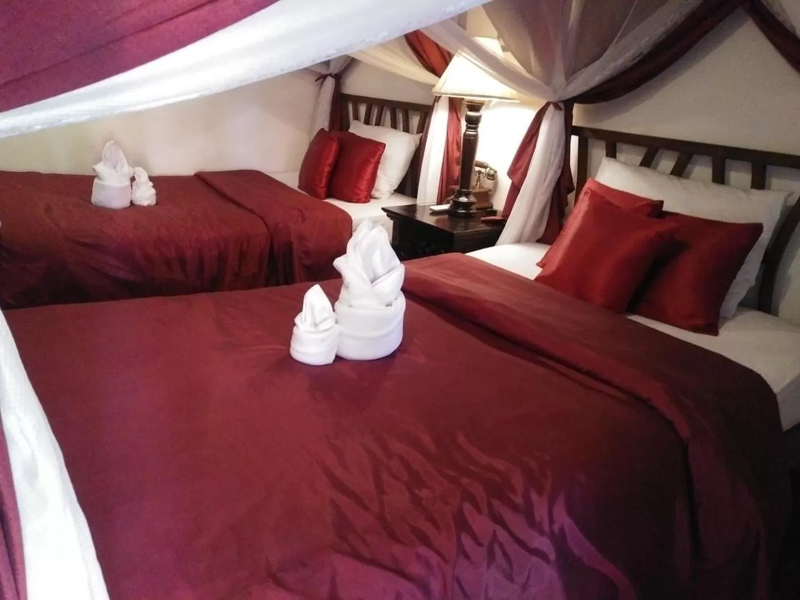 Bed in Tri Yaan Na Ros Colonial House