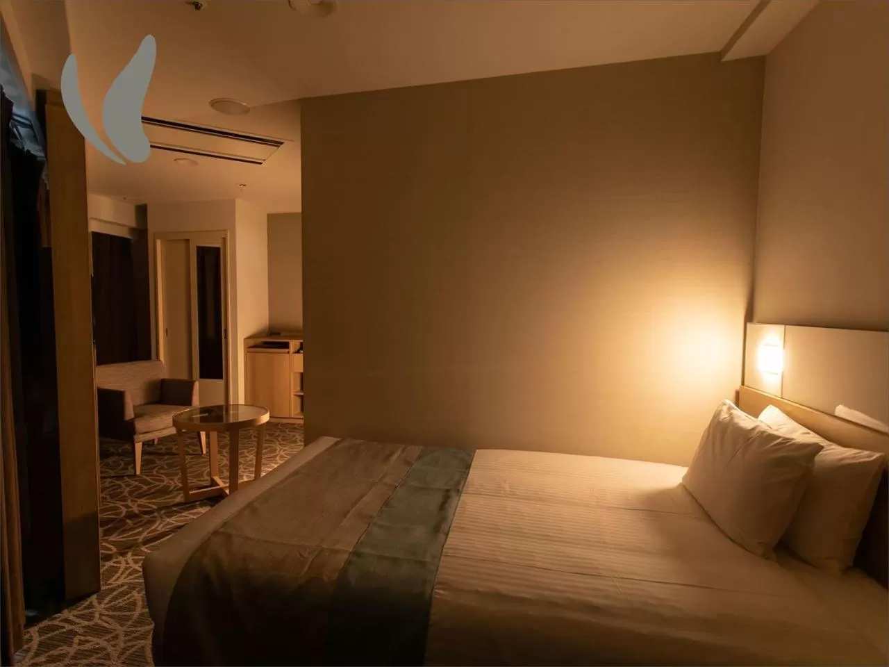 Photo of the whole room, Bed in Hotel Hokke Club Naha Shintoshin