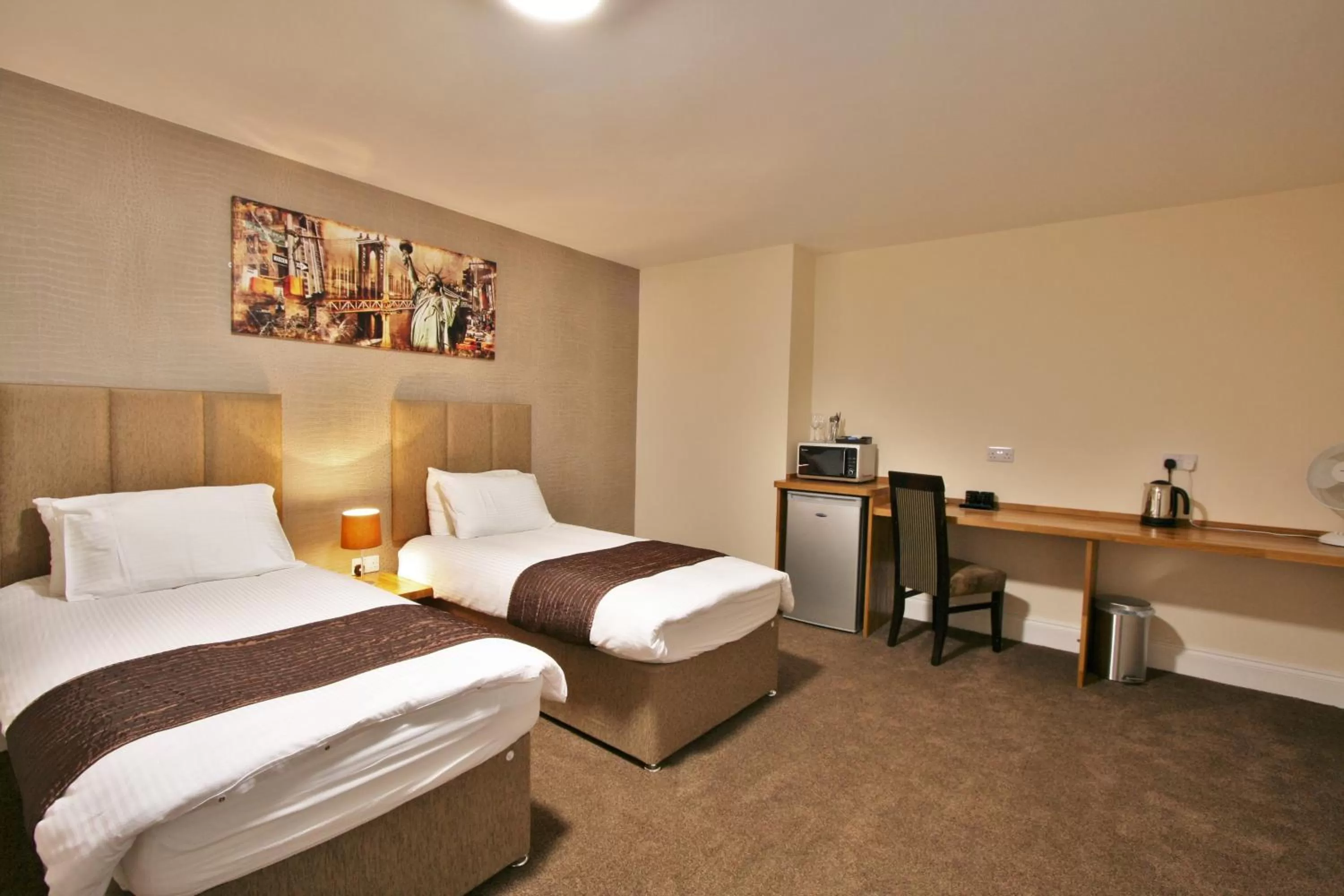 Bed in New County Hotel & Serviced Apartments by RoomsBooked