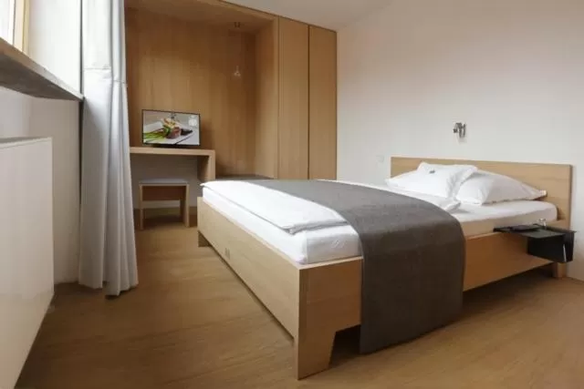 Photo of the whole room, Bed in Hotel Neuwirt