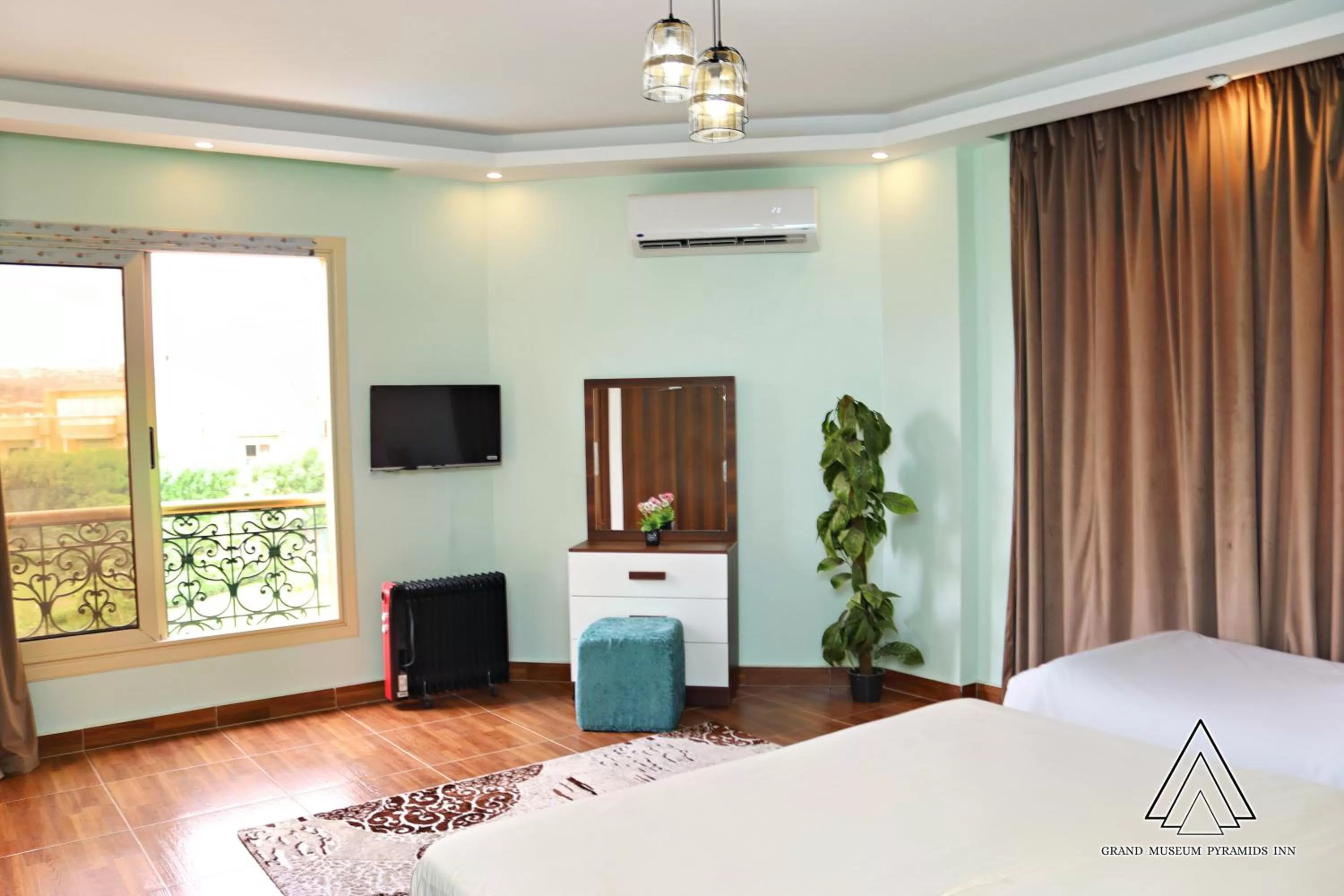 Bed in Grand Museum Pyramids Inn