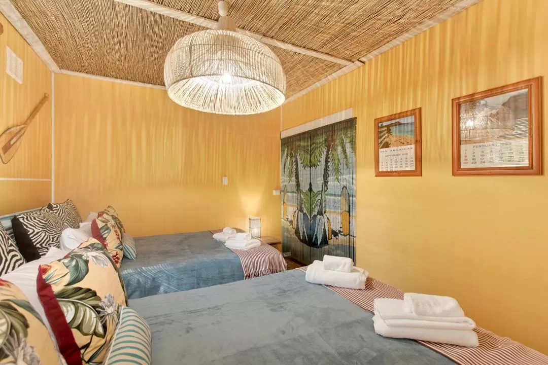 Bed in Manly Waves Studios & Apartments