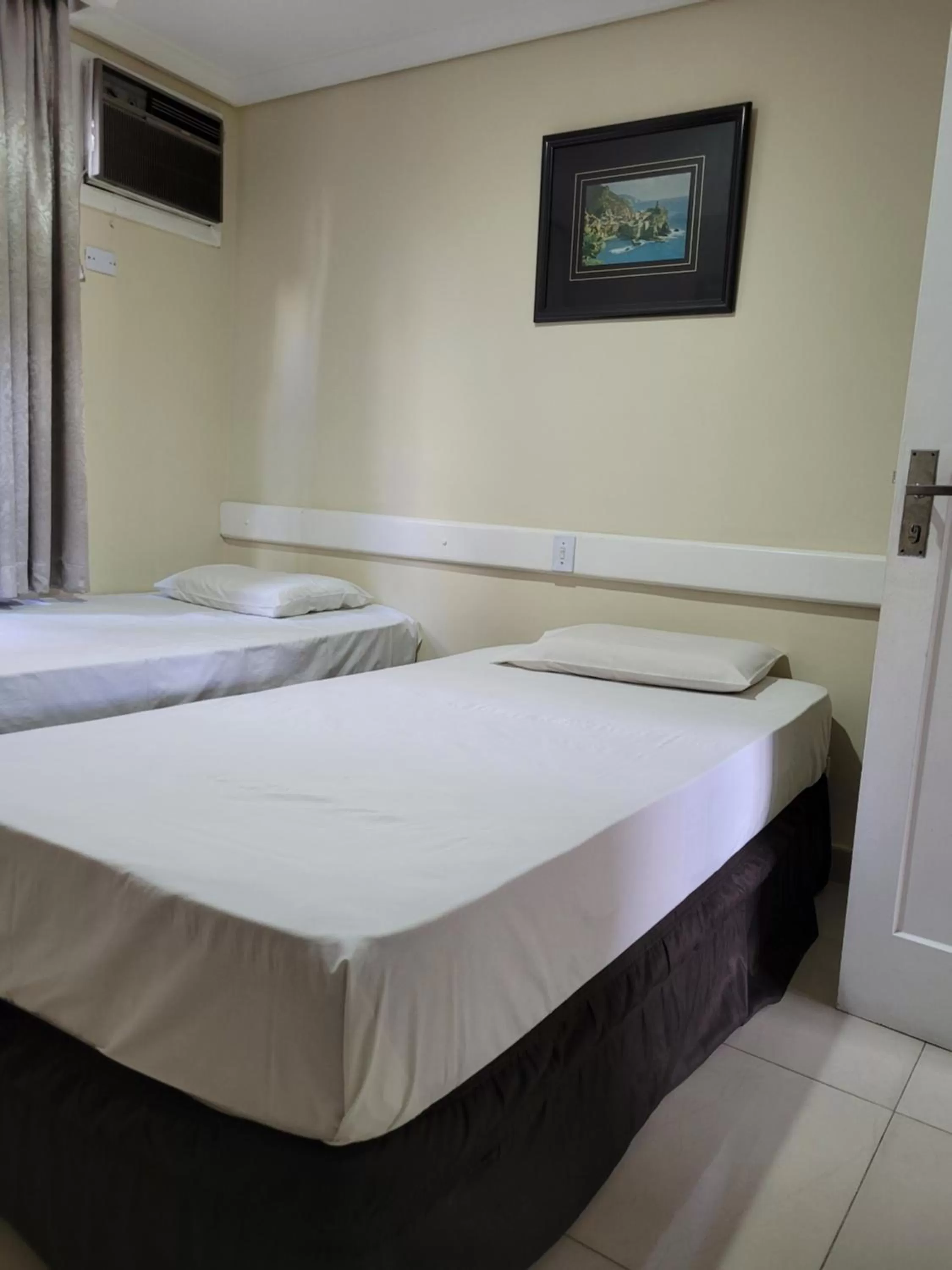 Bed in Hotel Estação Express