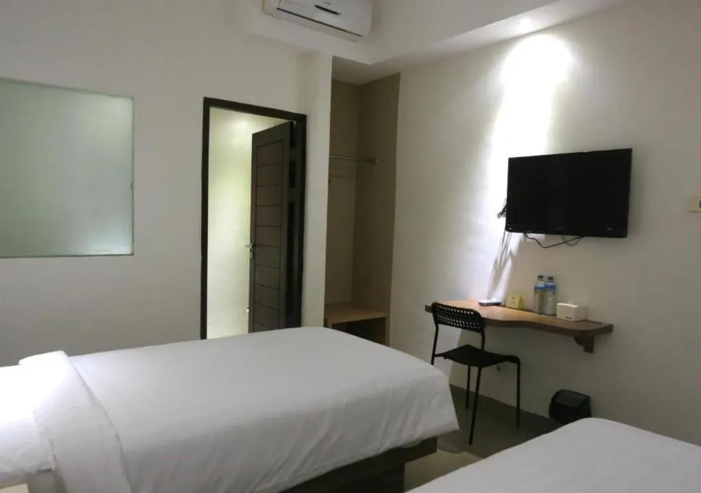 Bed in Hart Hotel Arjuna