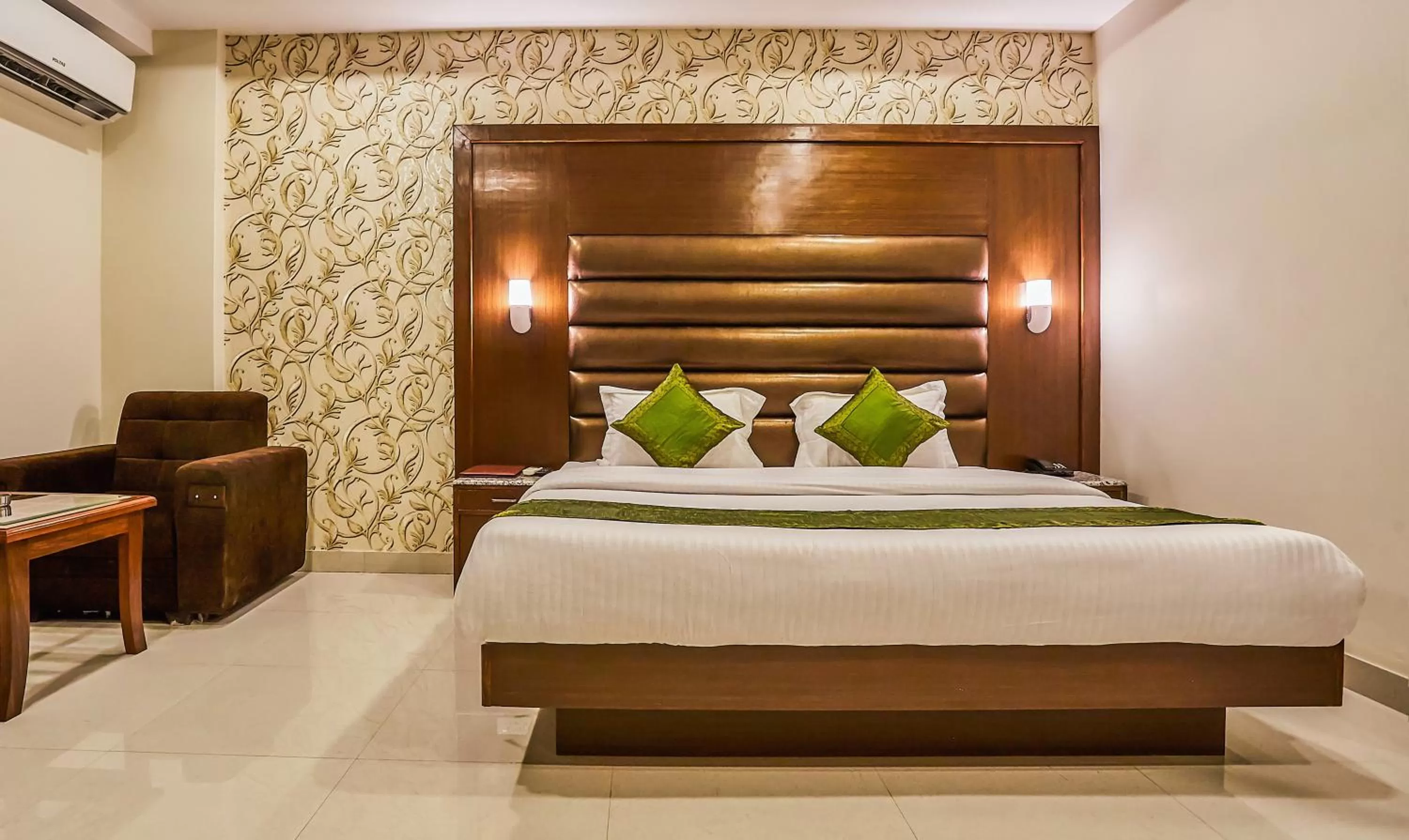 Bedroom, Bed in Treebo Grand Legacy Elite With Roof Top Cafe