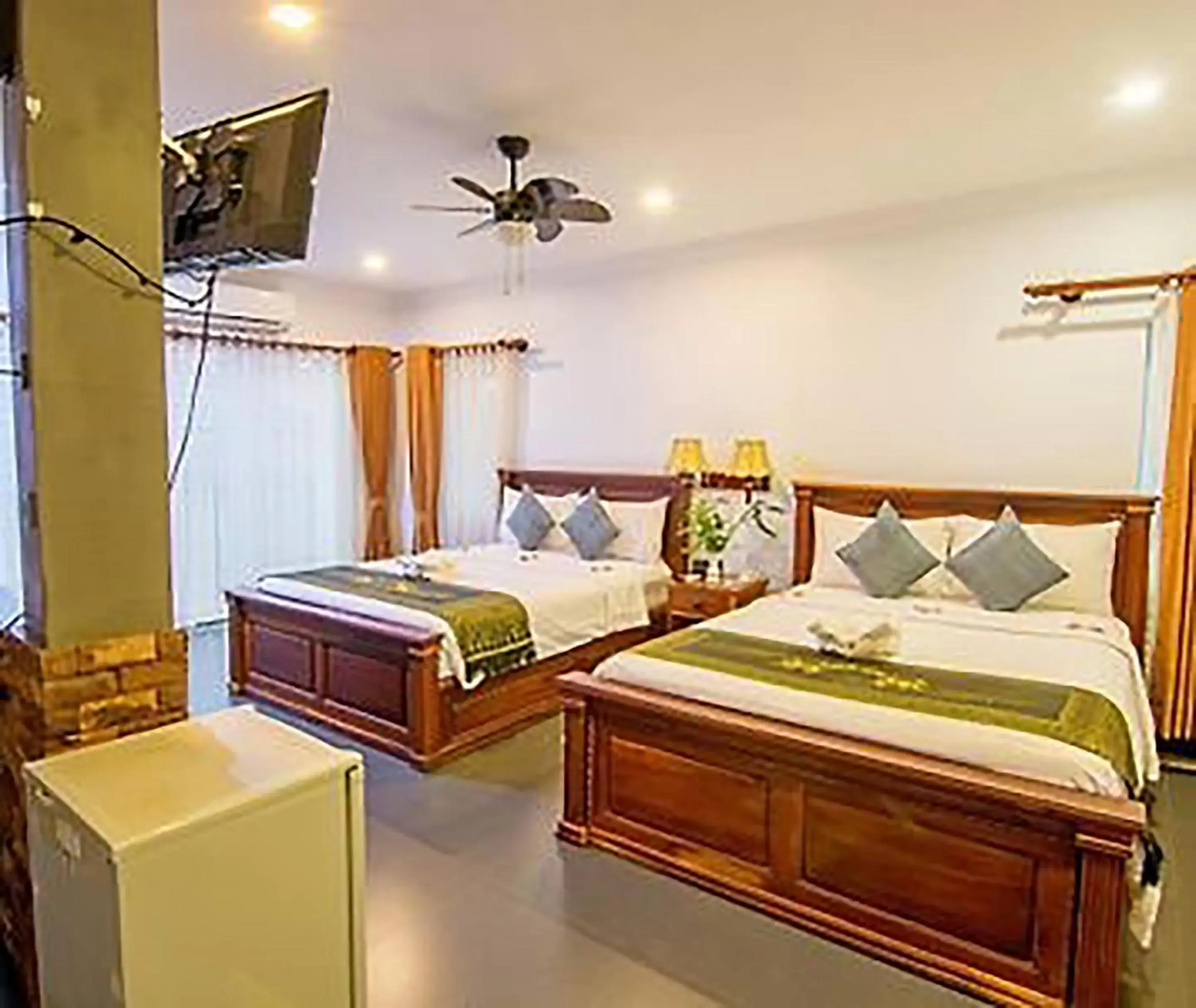 Deluxe Queen Room with Two Queen Beds in The Five Senses Boutique Hotel Deluxe Queen Room with Two Queen Beds in The Five Senses Boutique Hotel