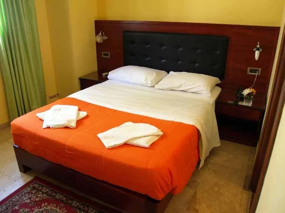 Bed in Hotel Filoxenia