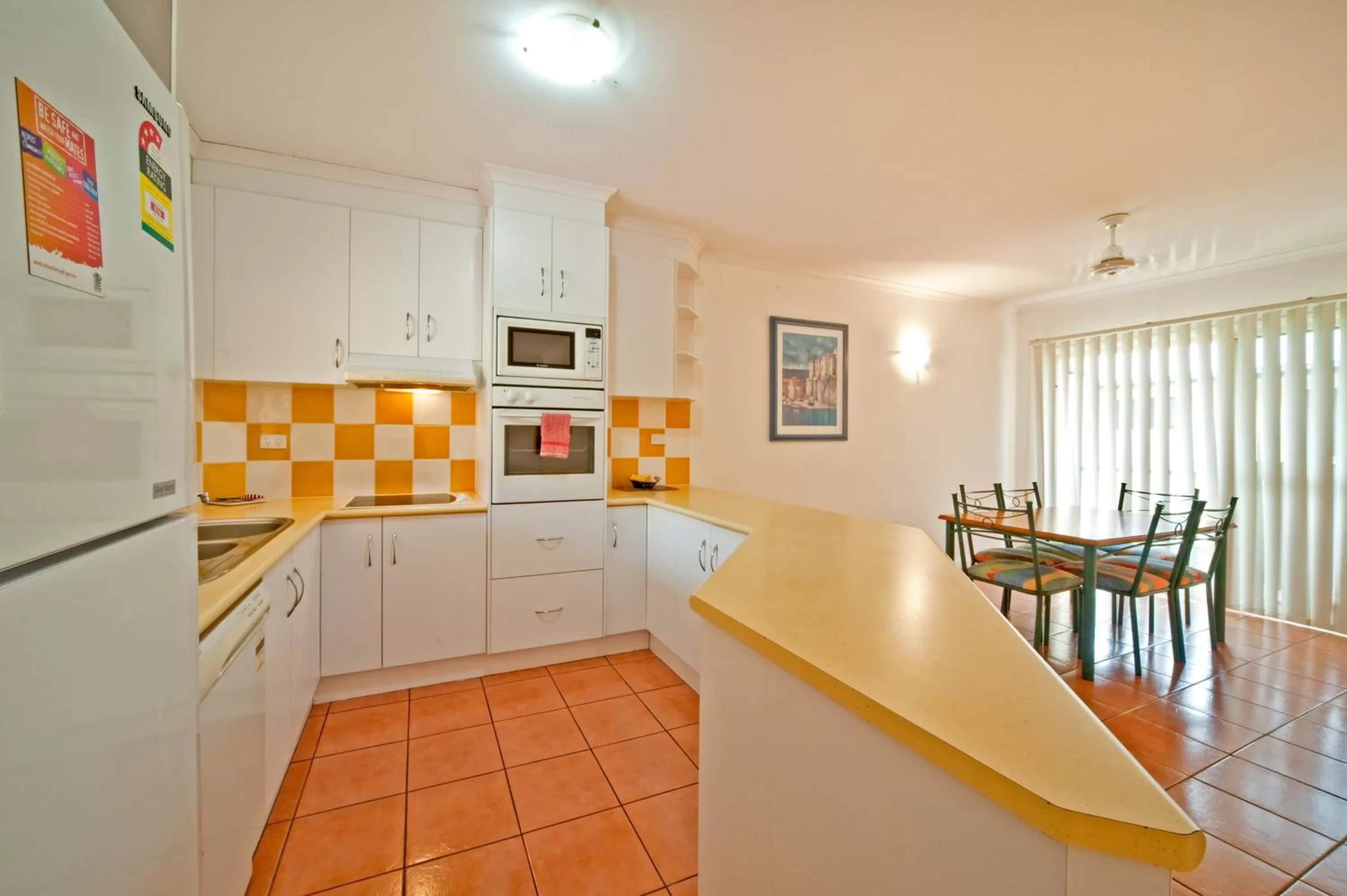 Kitchen or kitchenette in at Beach Court Holiday Villas