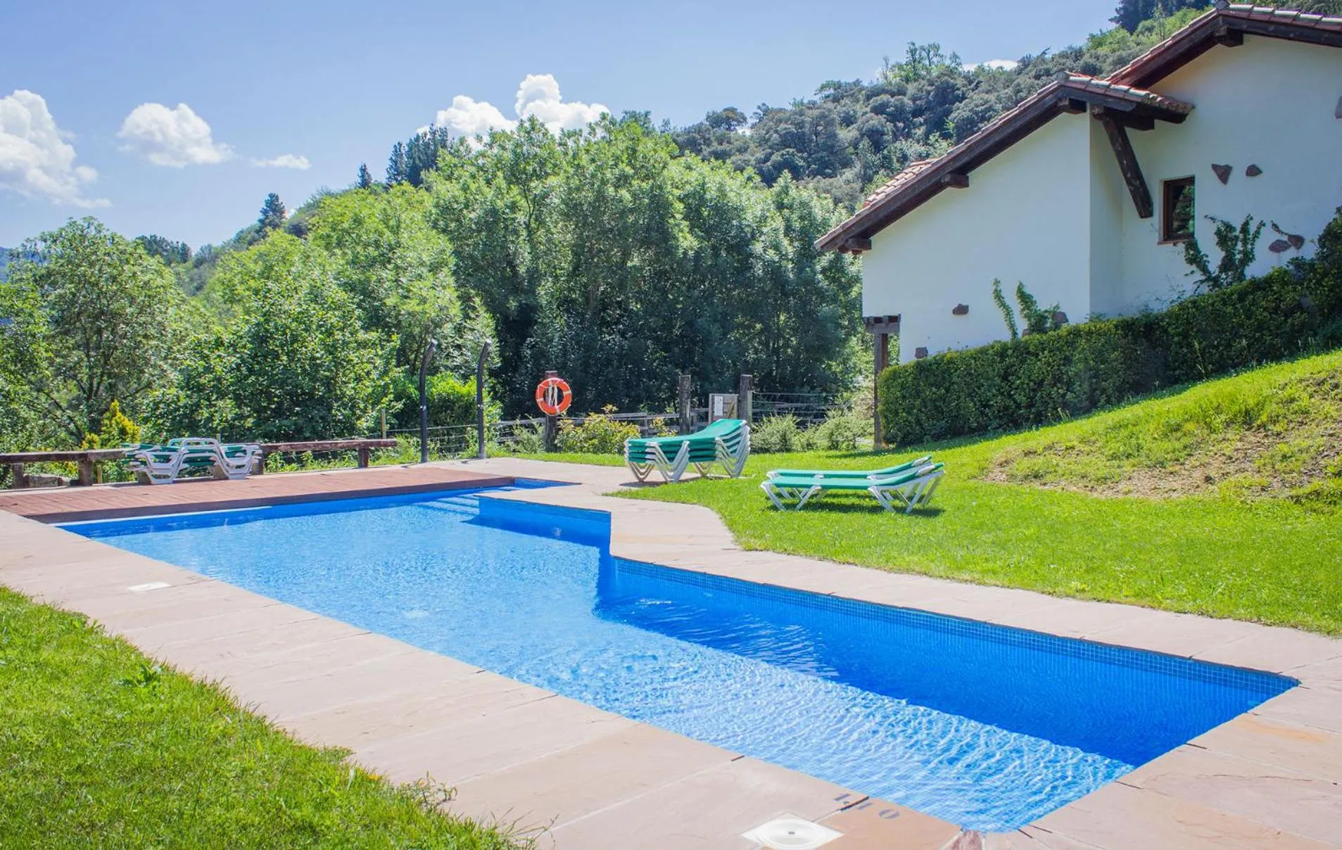Pool view in Viviendas Rurales El Covaju