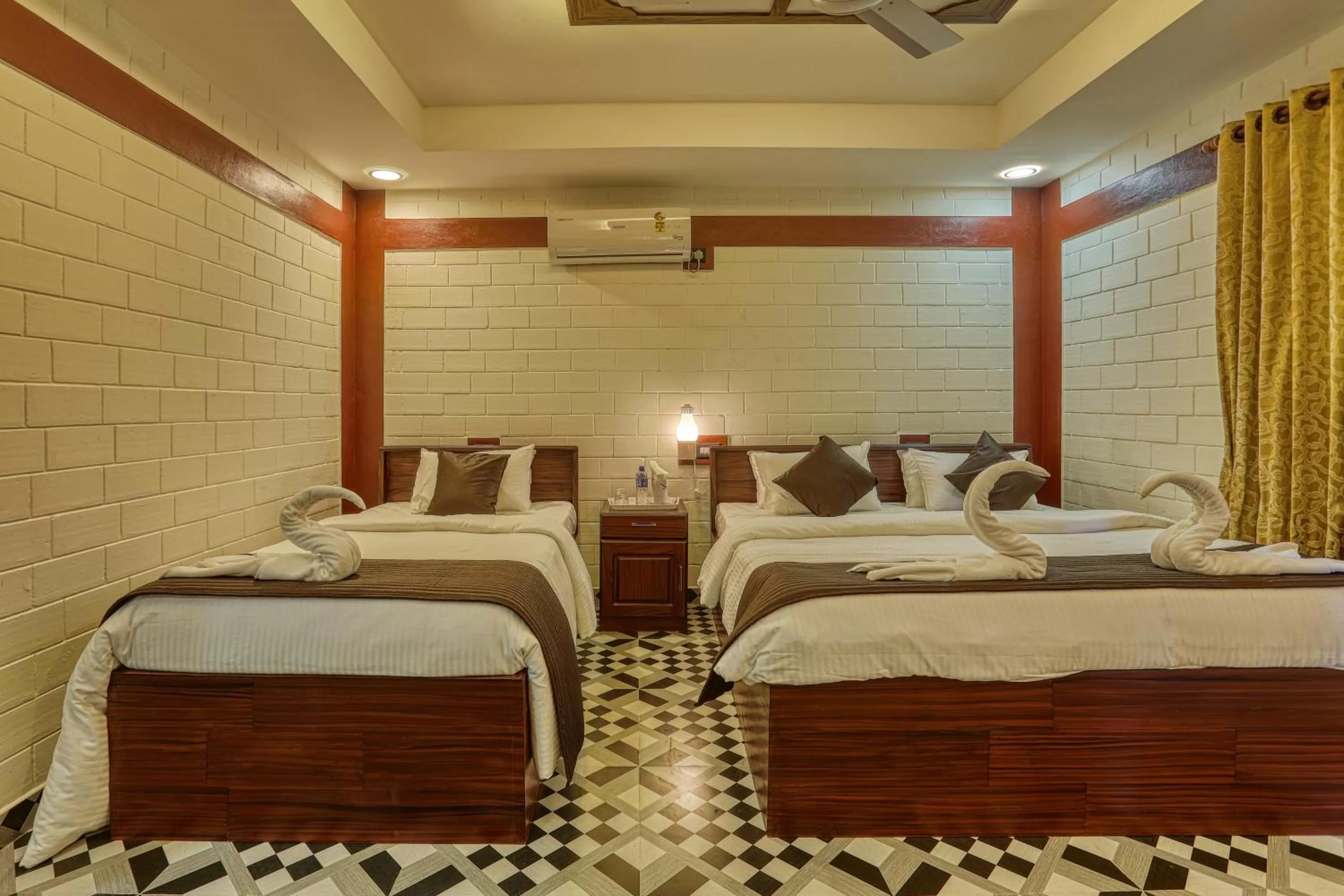 Bed in LEISURE VALLEY BEACH RESORT