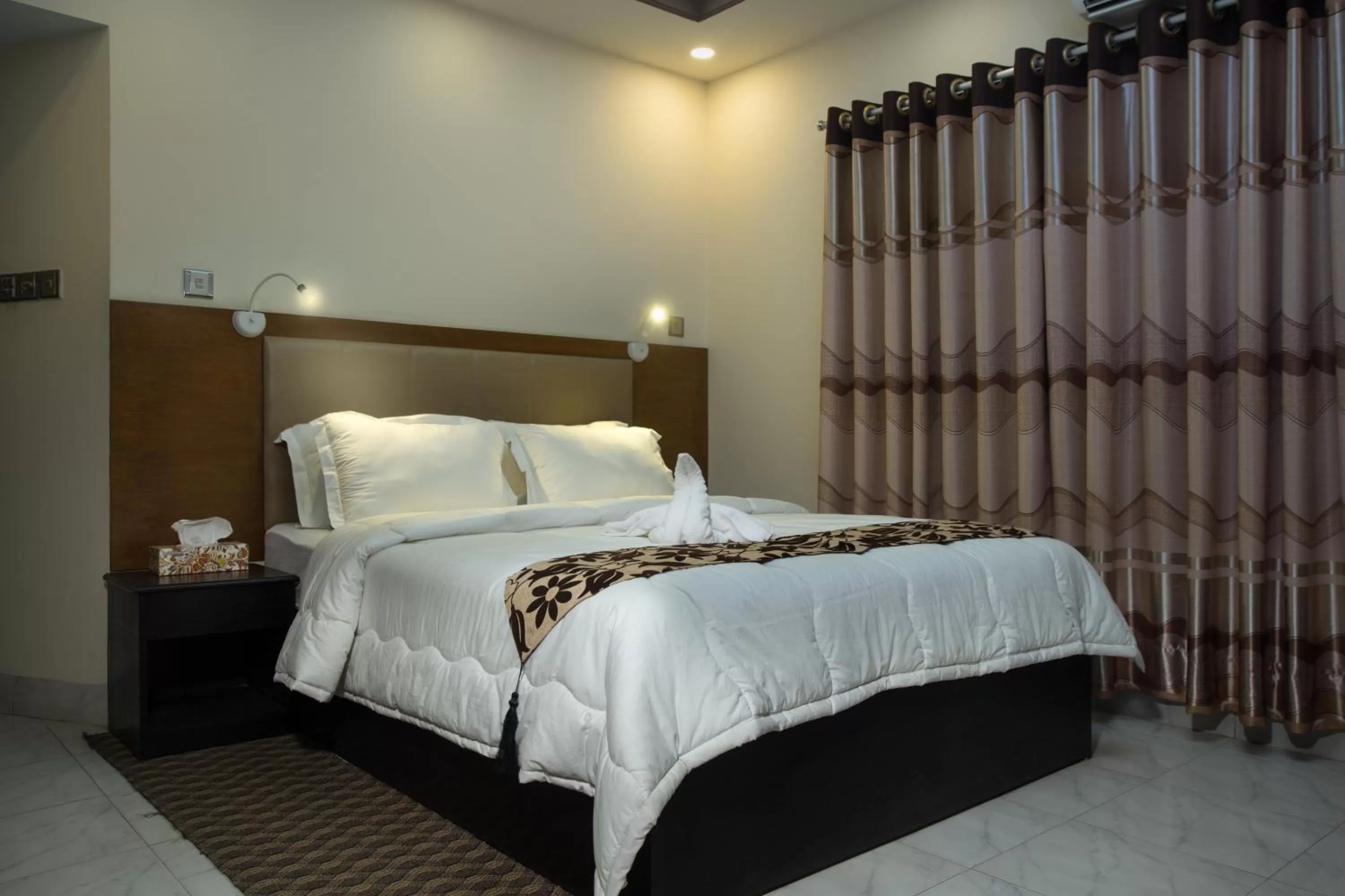 Bed in Memento Residence