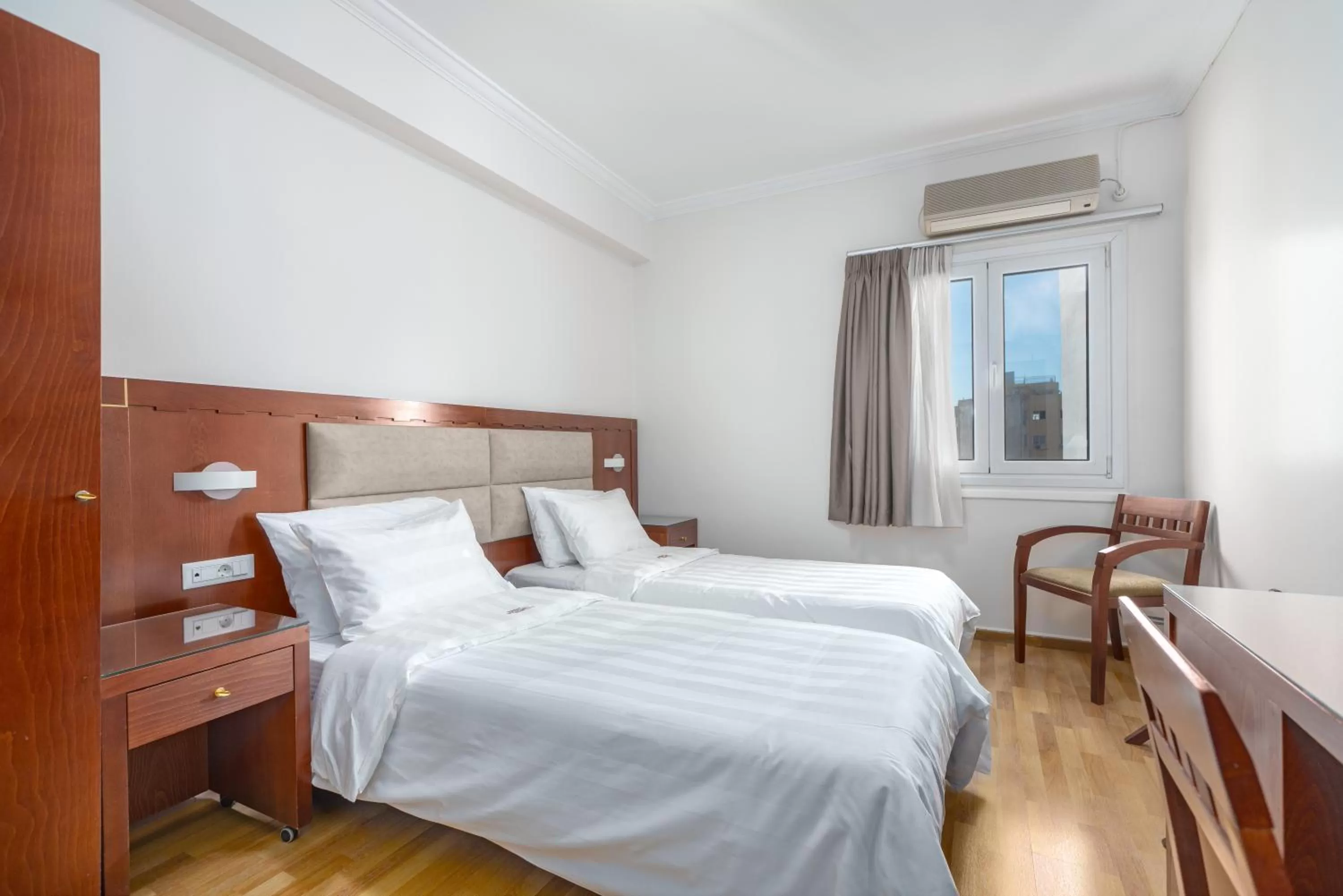 Bed in Attalos Hotel