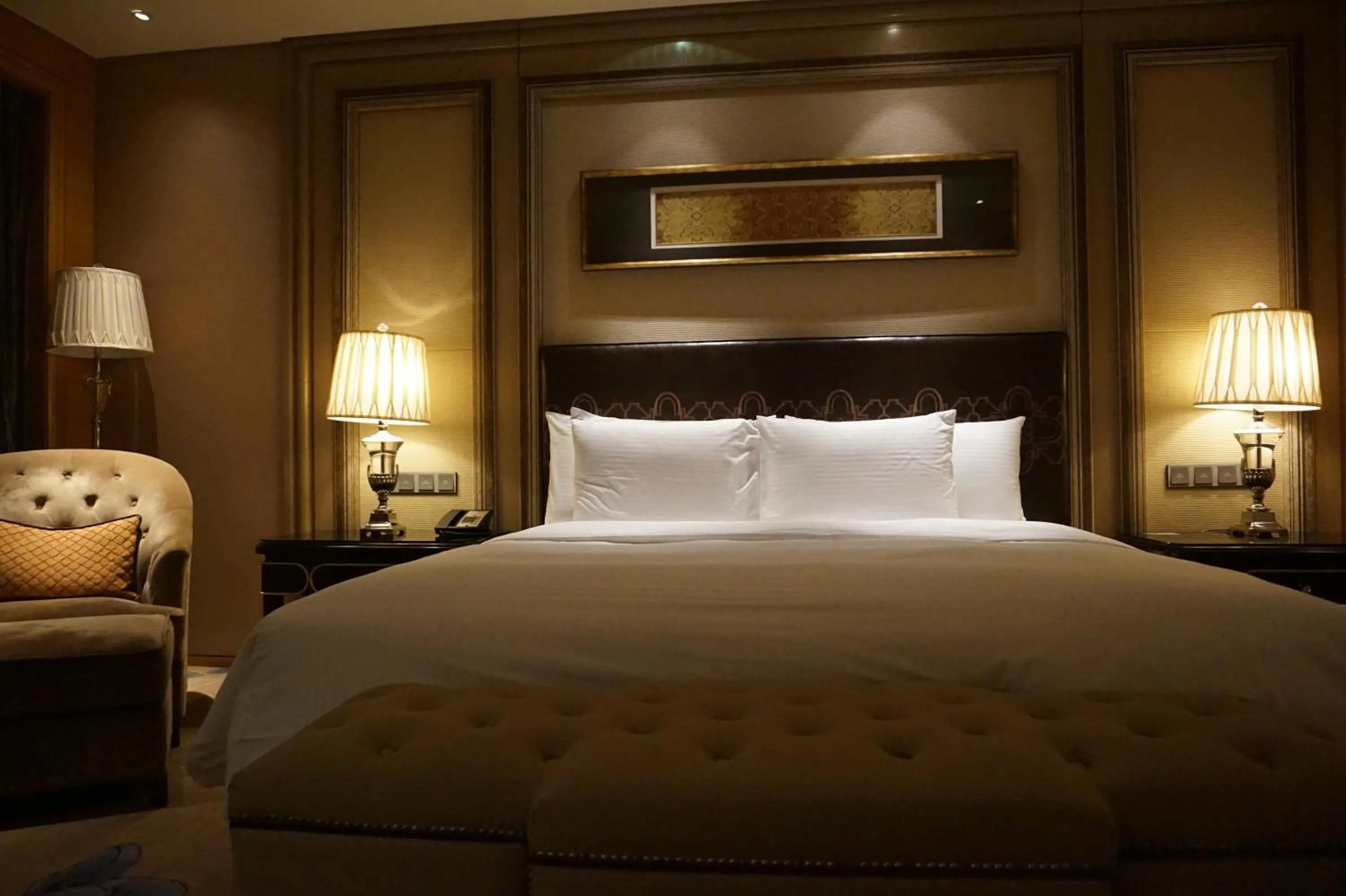 Bed in Wanda Realm Harbin Hotel