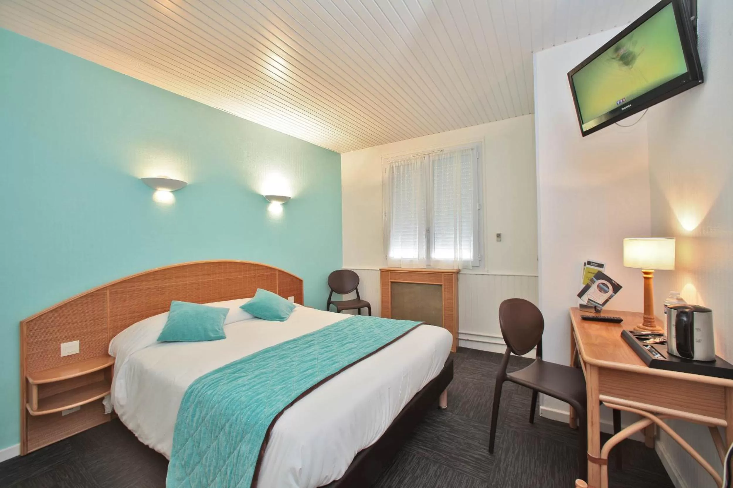 Bed in Hotel Les Dunes