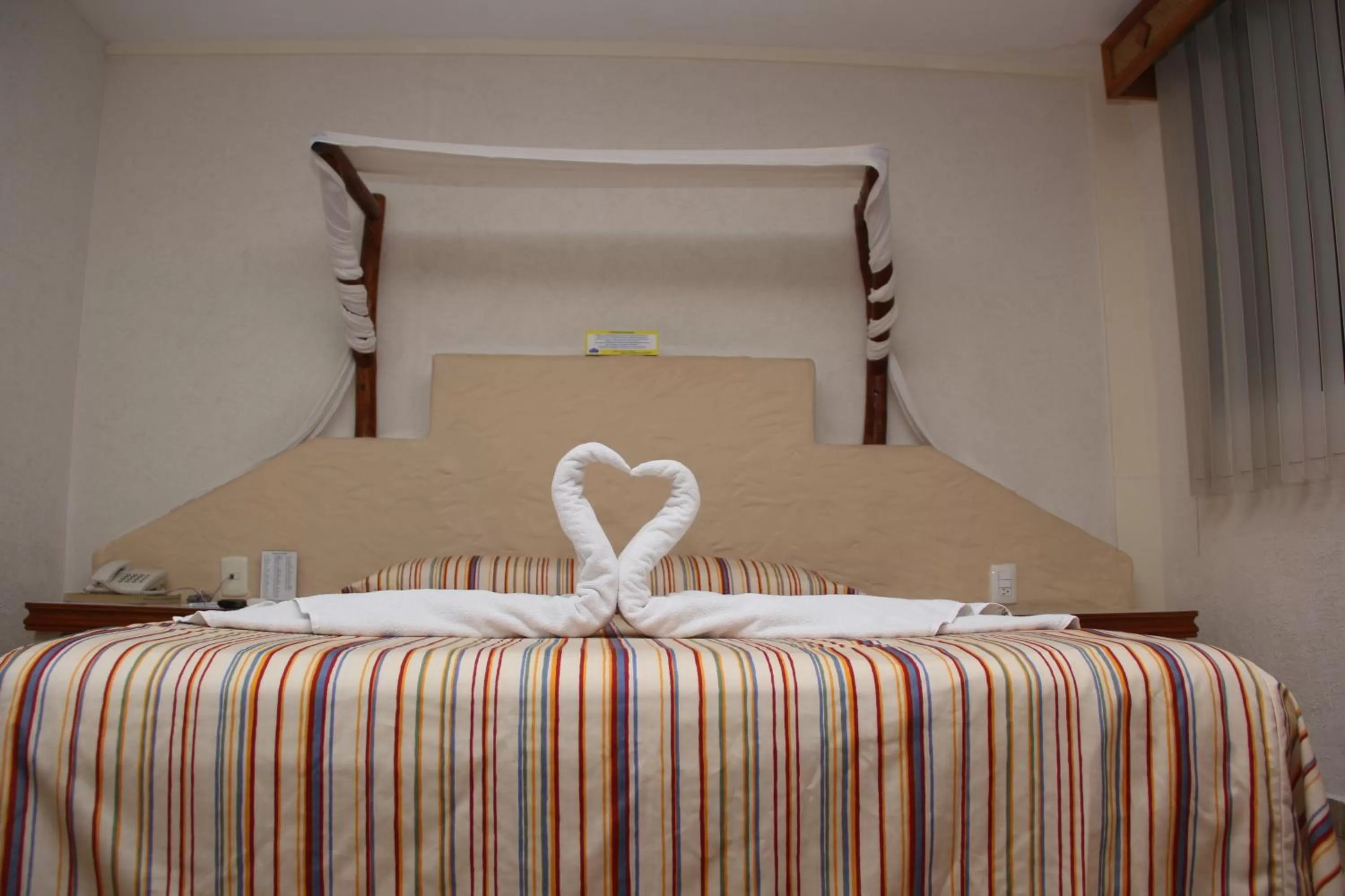 Bed in Hotel Palapa Palace