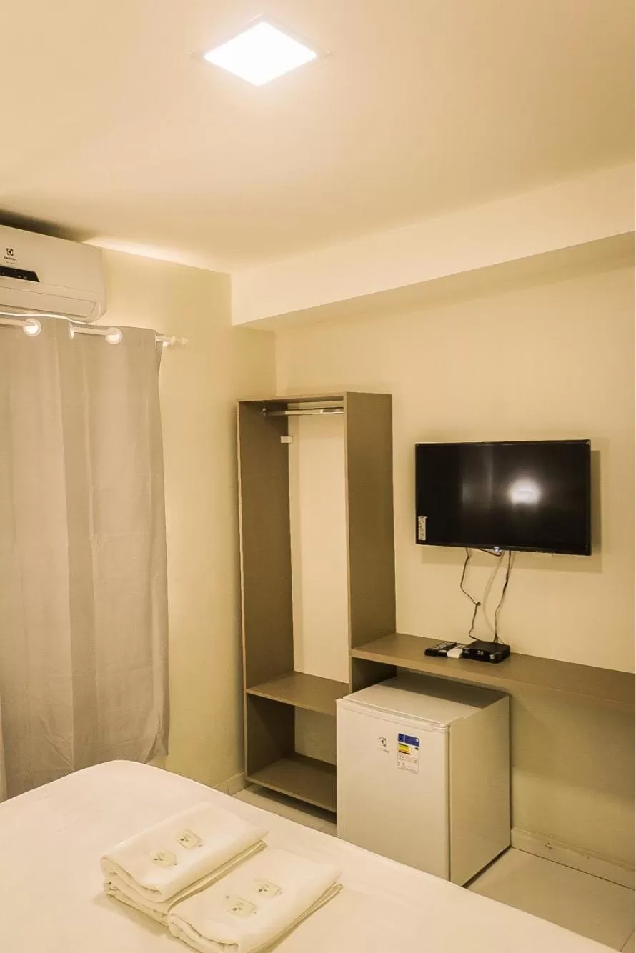 TV/Entertainment Center in Pousada Vila do Carmo