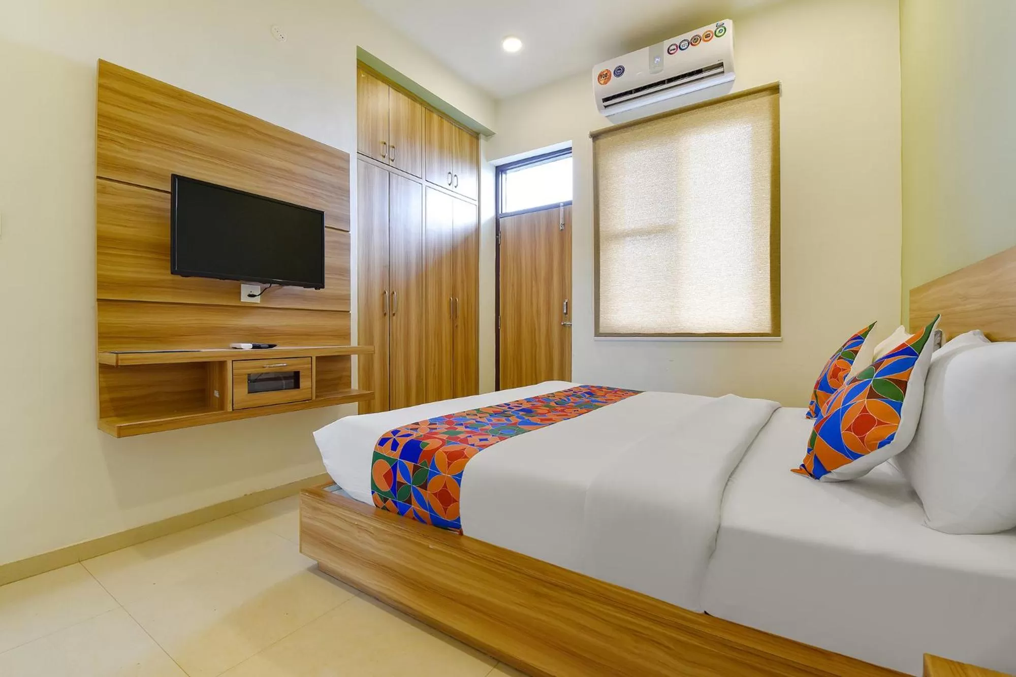 Bed in FabHotel Prime Oxus