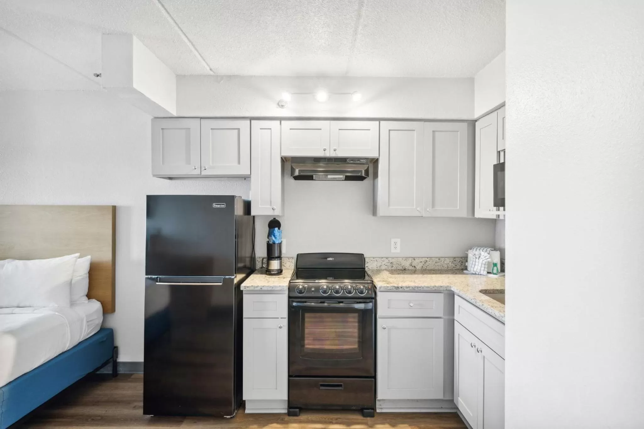 kitchen, Bed in Sugar Sands Beachfront Hotel, a By The Sea Resort
