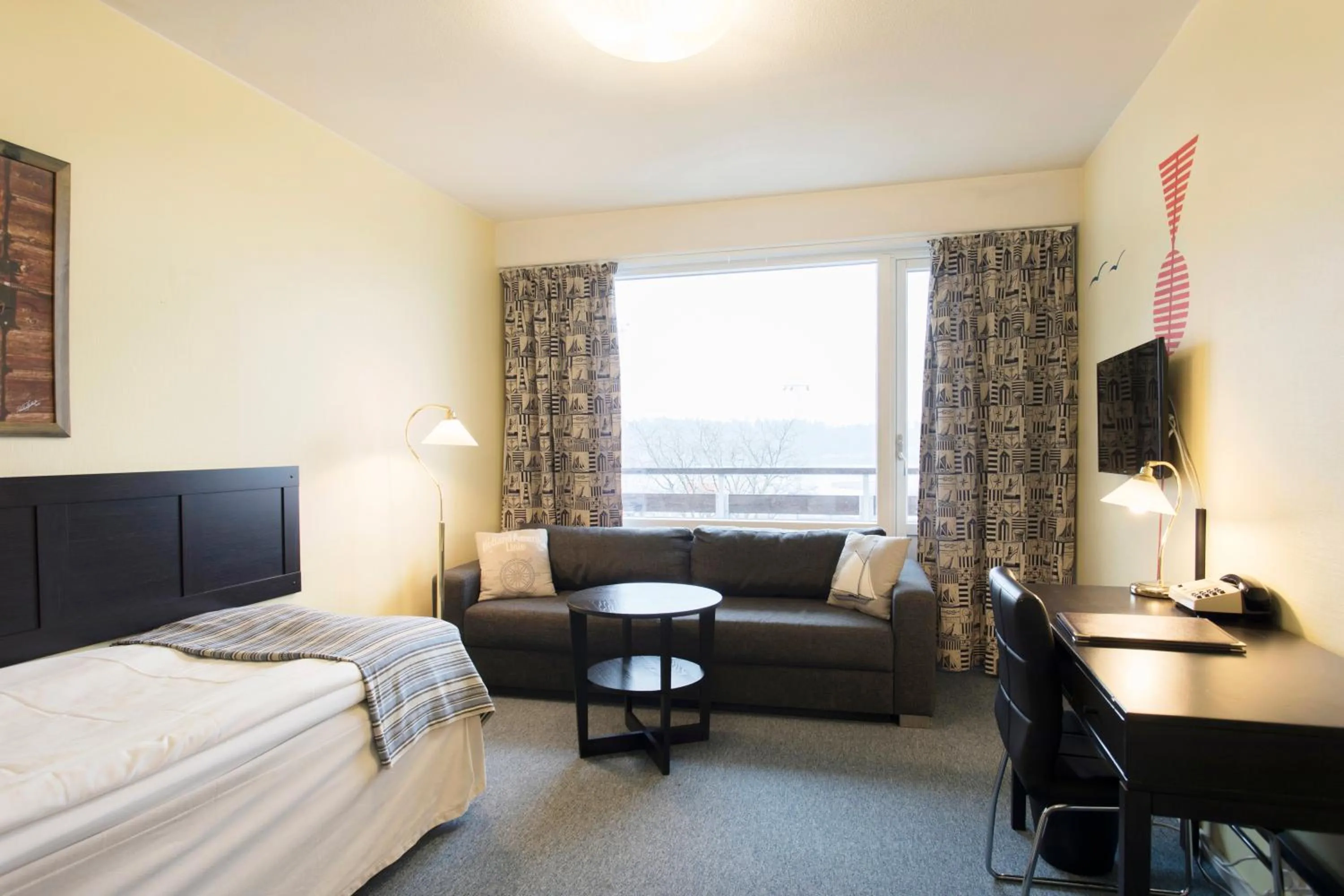 Photo of the whole room, Bed in Skärgårdshotellet