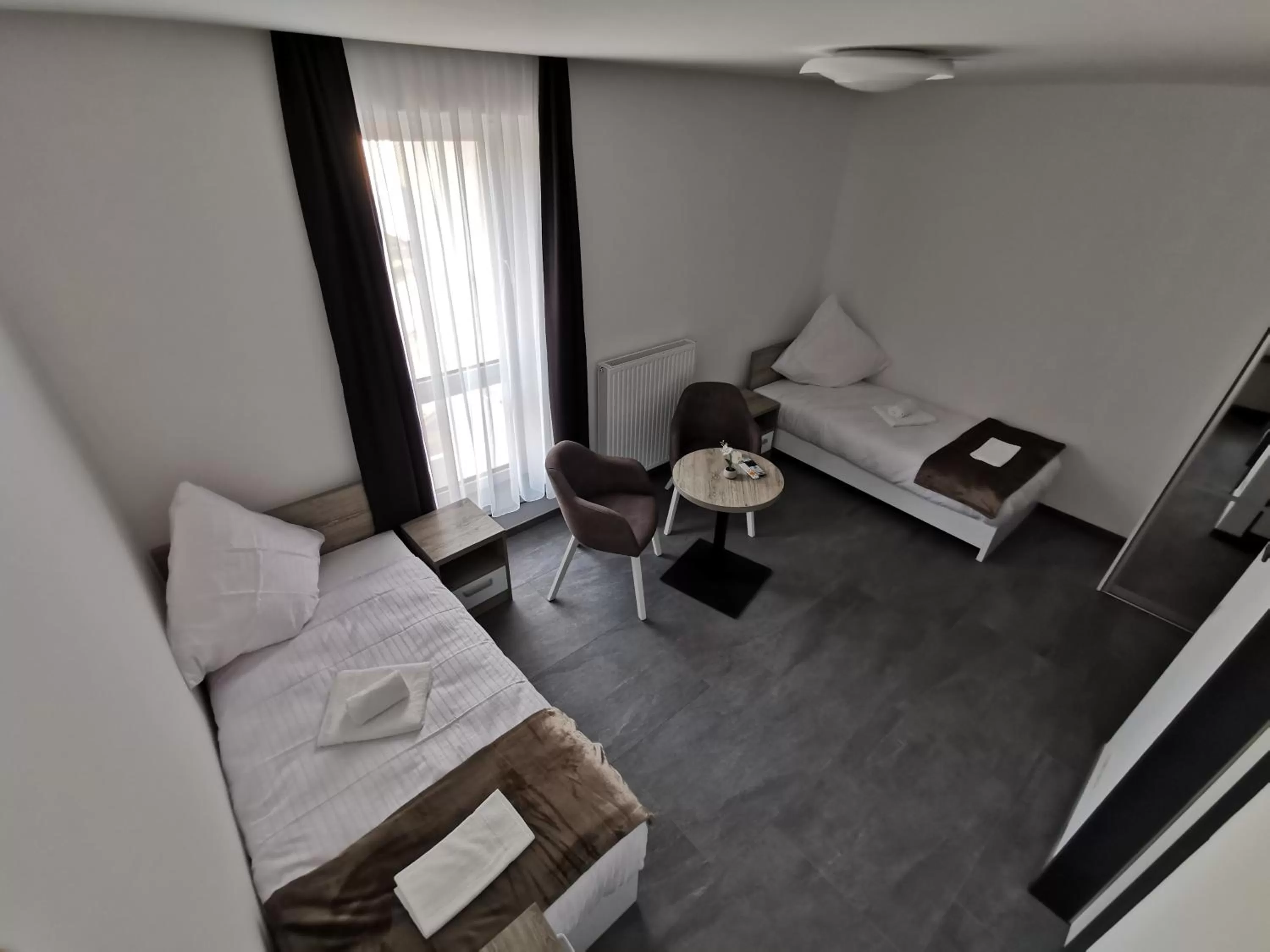 Living room, Bed in HP Apartments