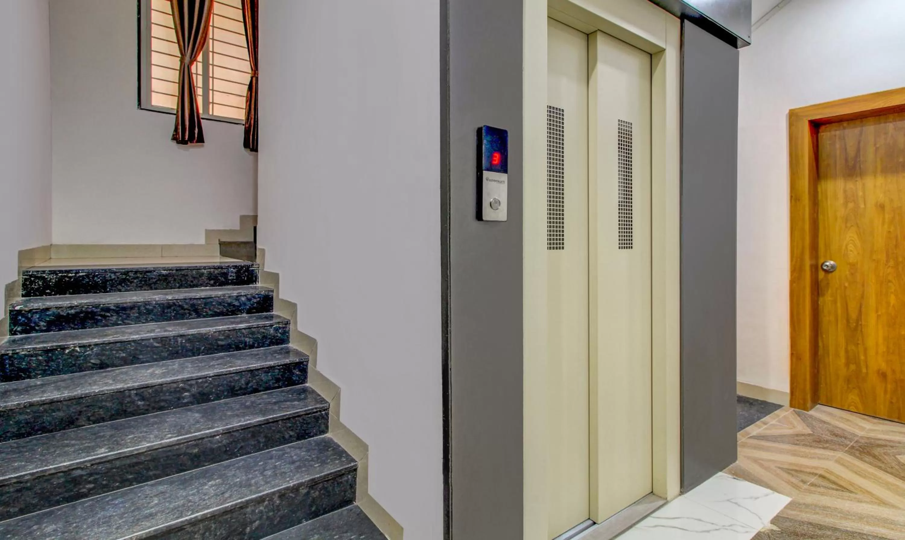 elevator in Treebo Trend White House