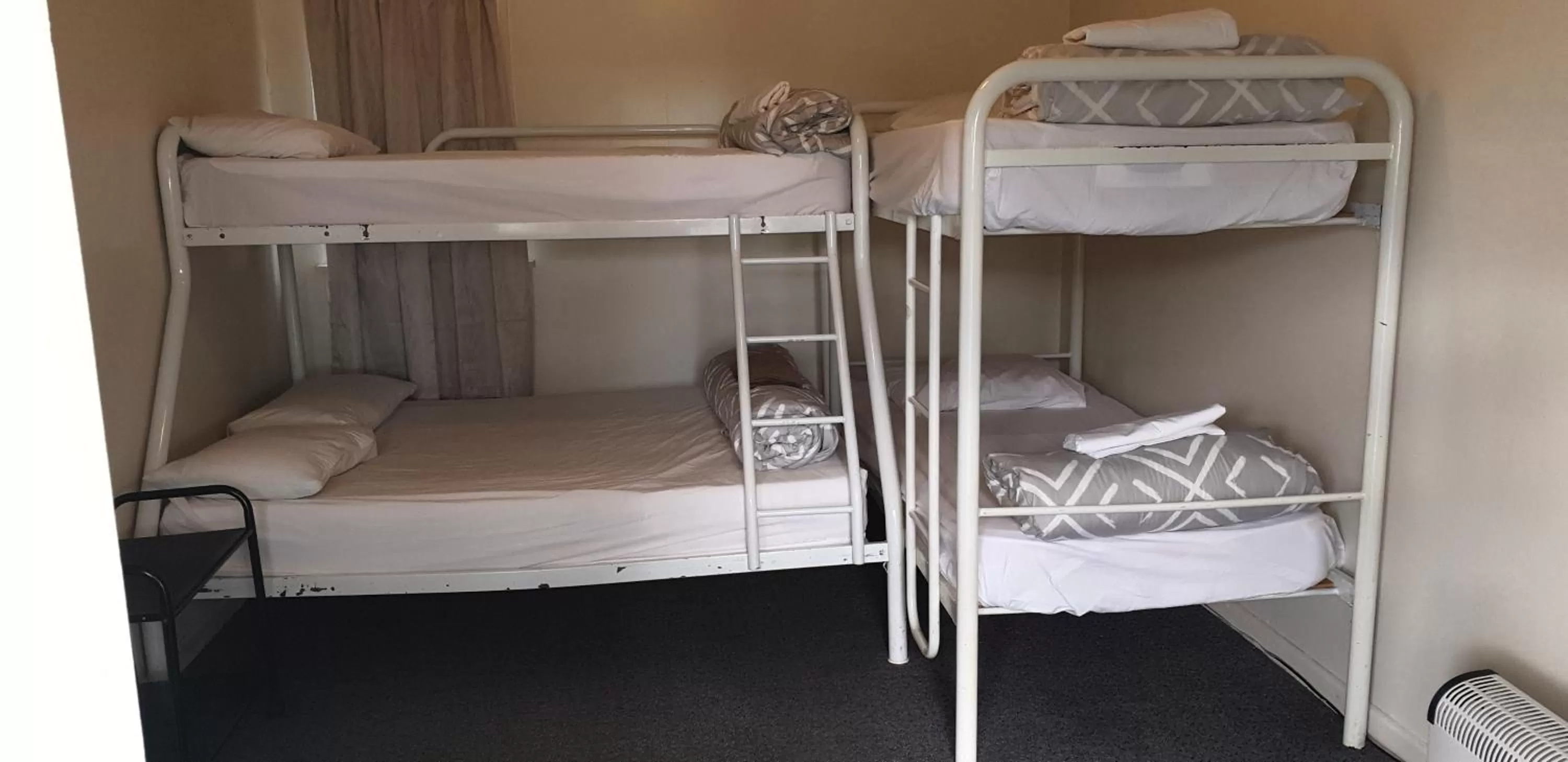 Bed in Camellia Court Family Motel