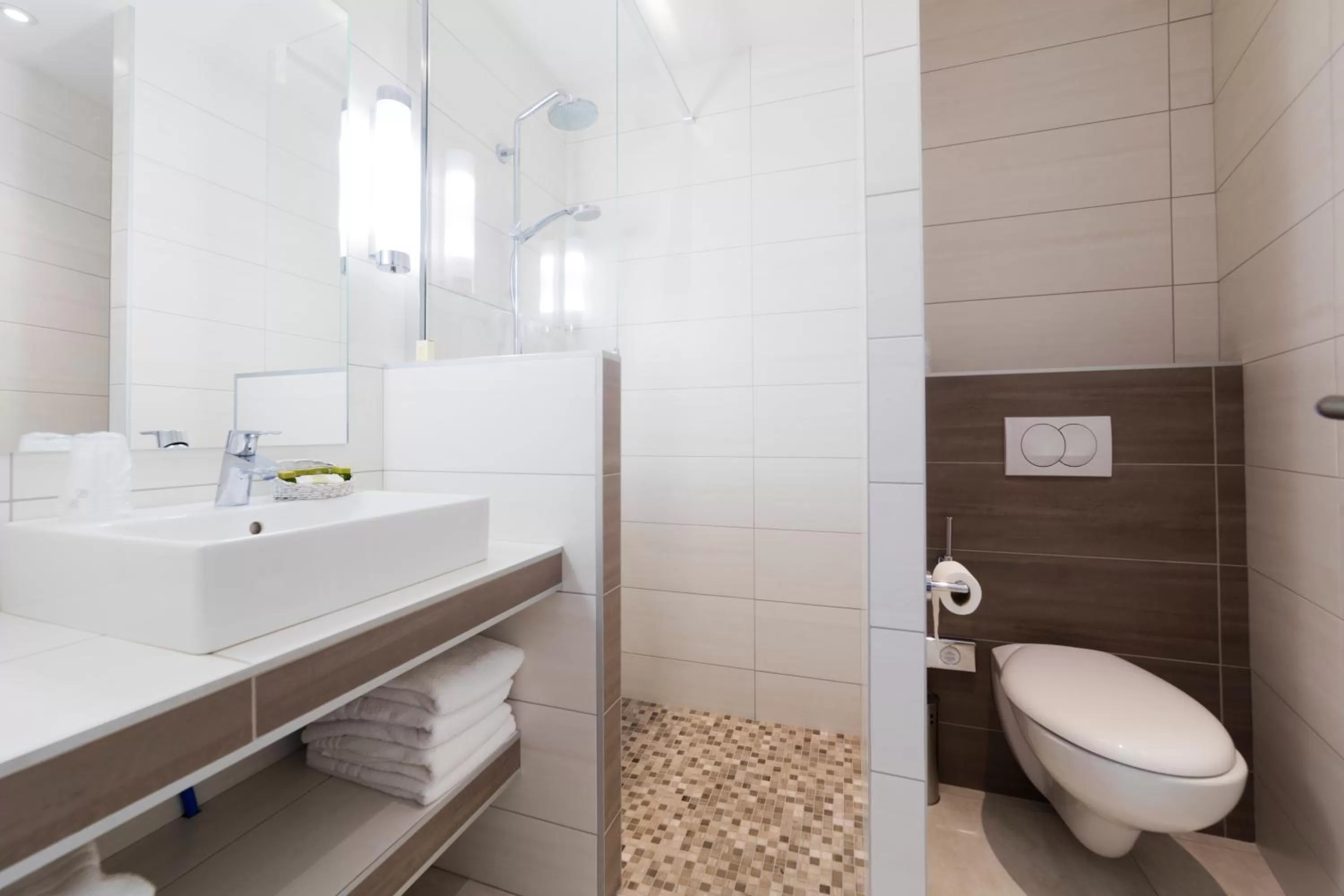 Bathroom in Logis Hôtel Restaurant Le Cours