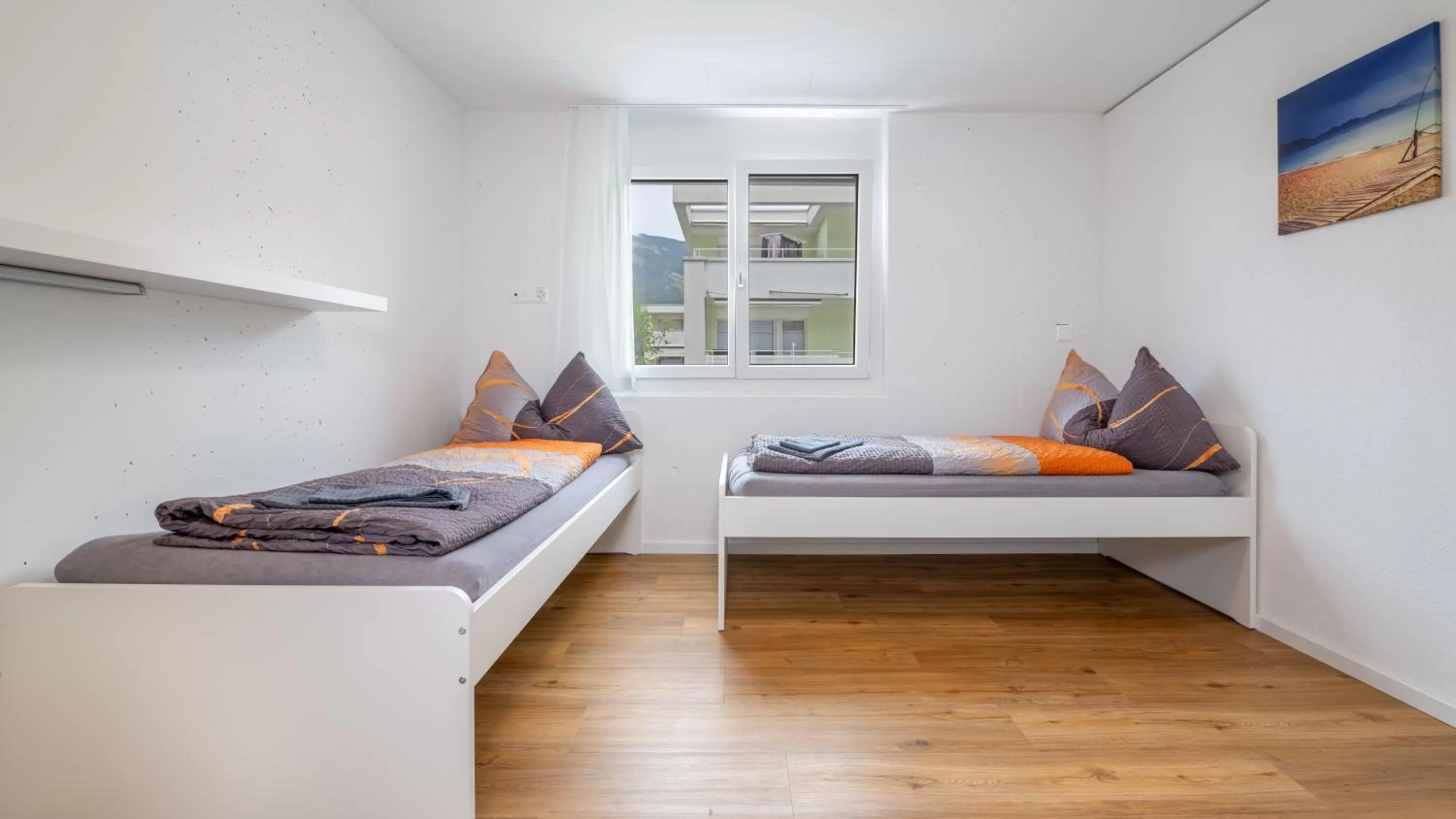 Bedroom, Bed in Anstatthotel Goldau - self-check-in