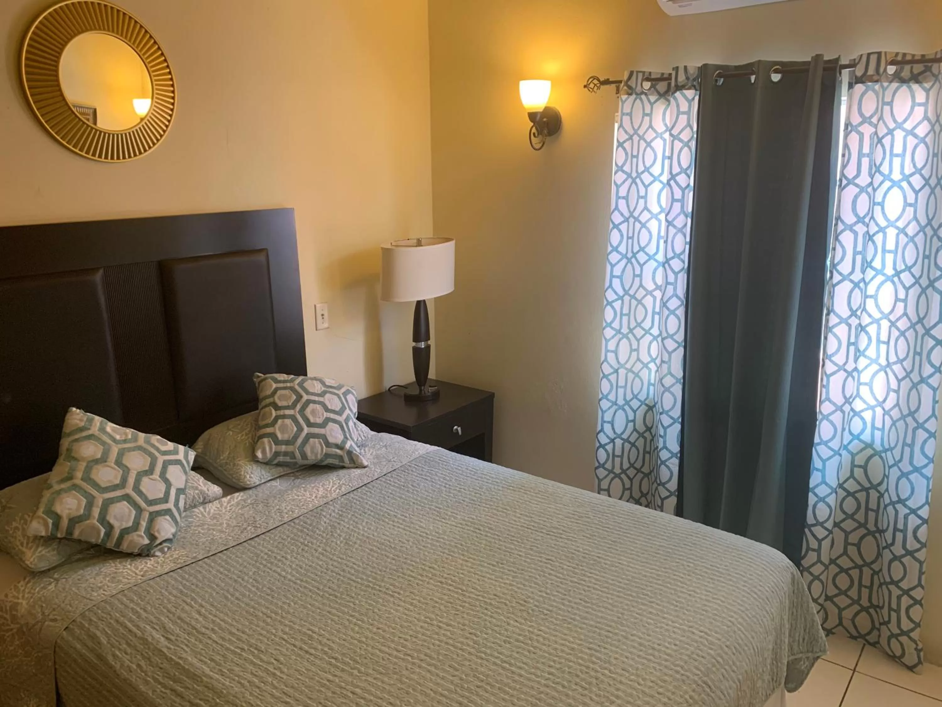 Bed in Connie's Comfort Suites