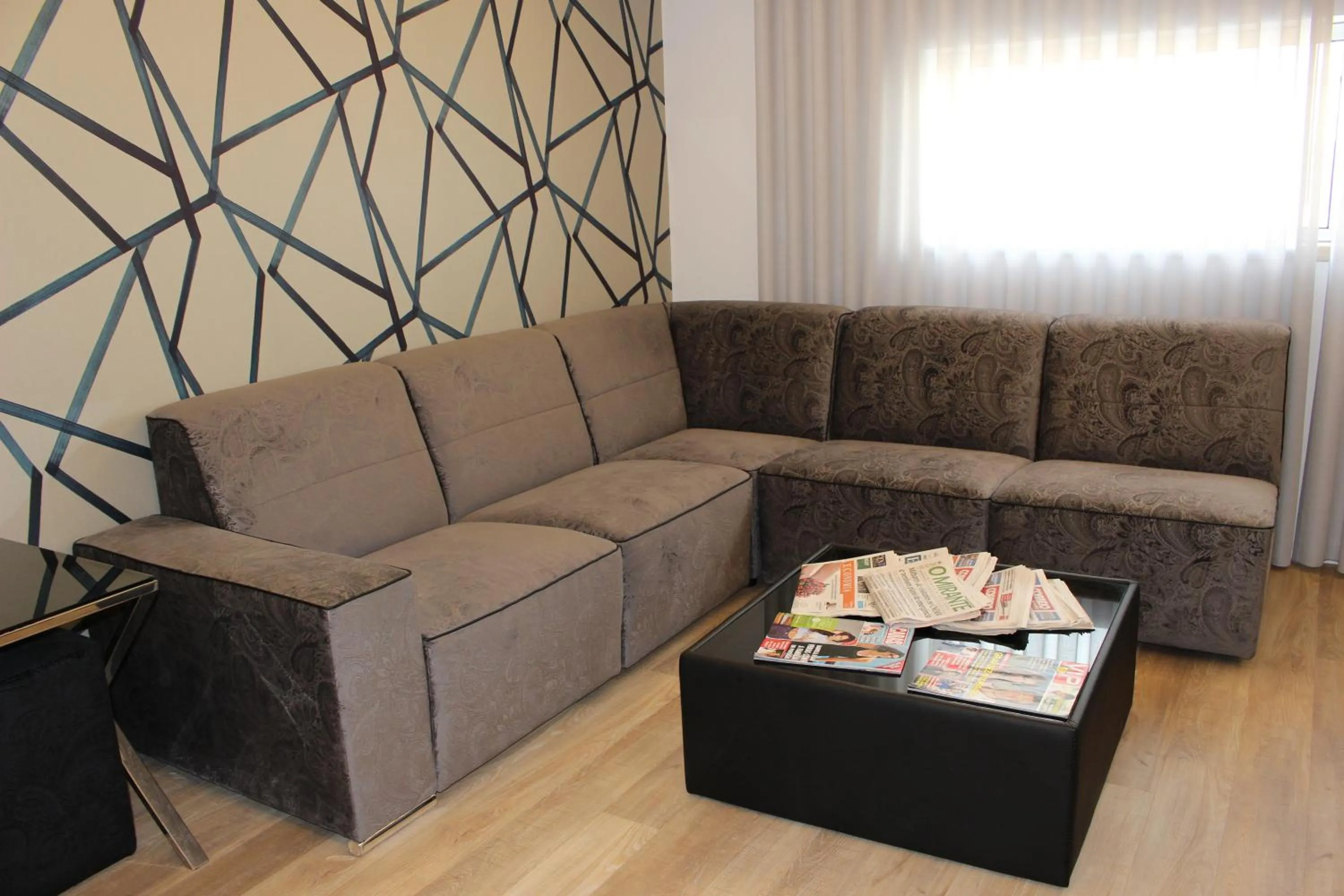 Communal lounge/ TV room in Hotel Genesis