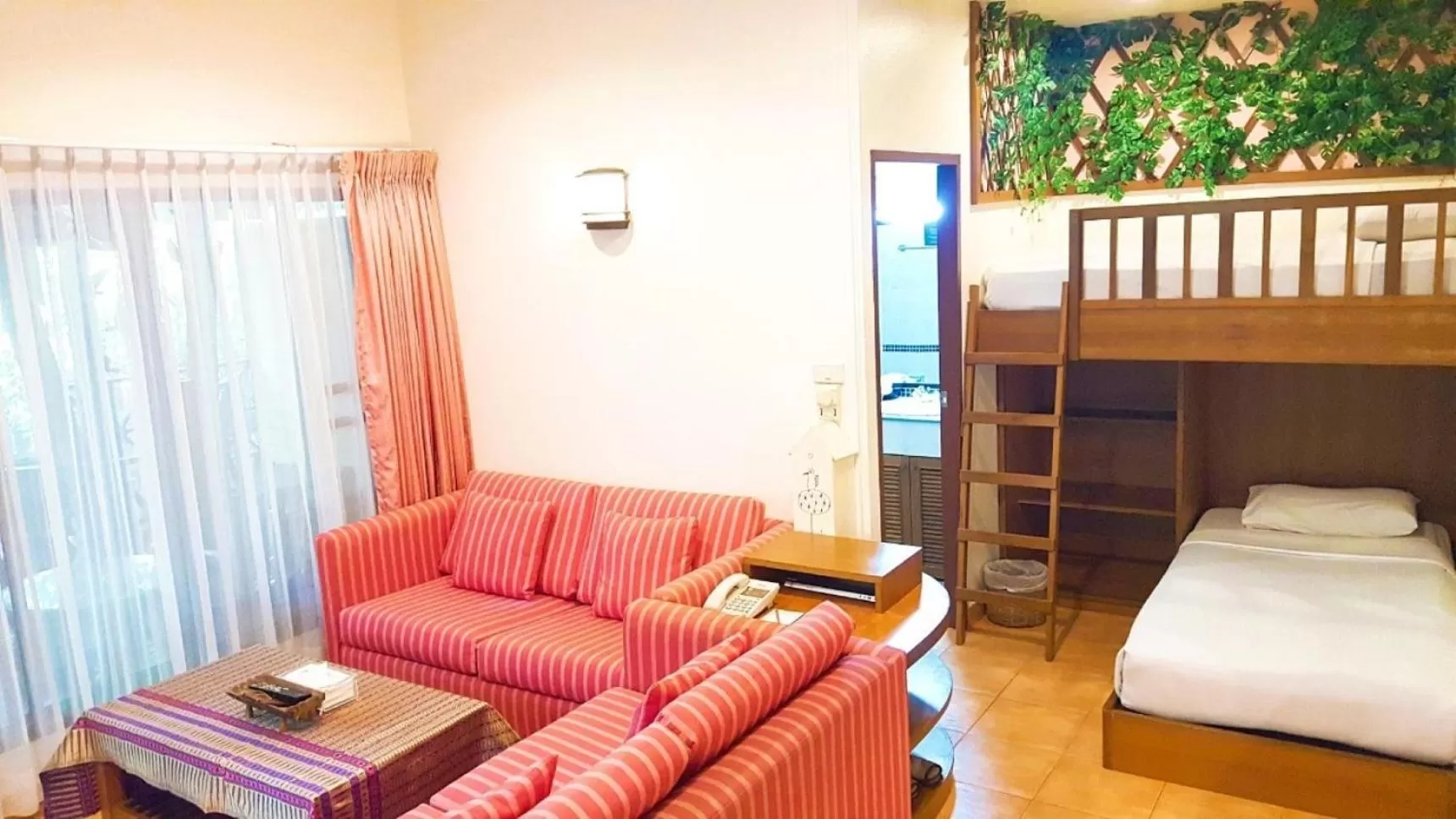 Seating area, Bed in Birds and Bees Resort