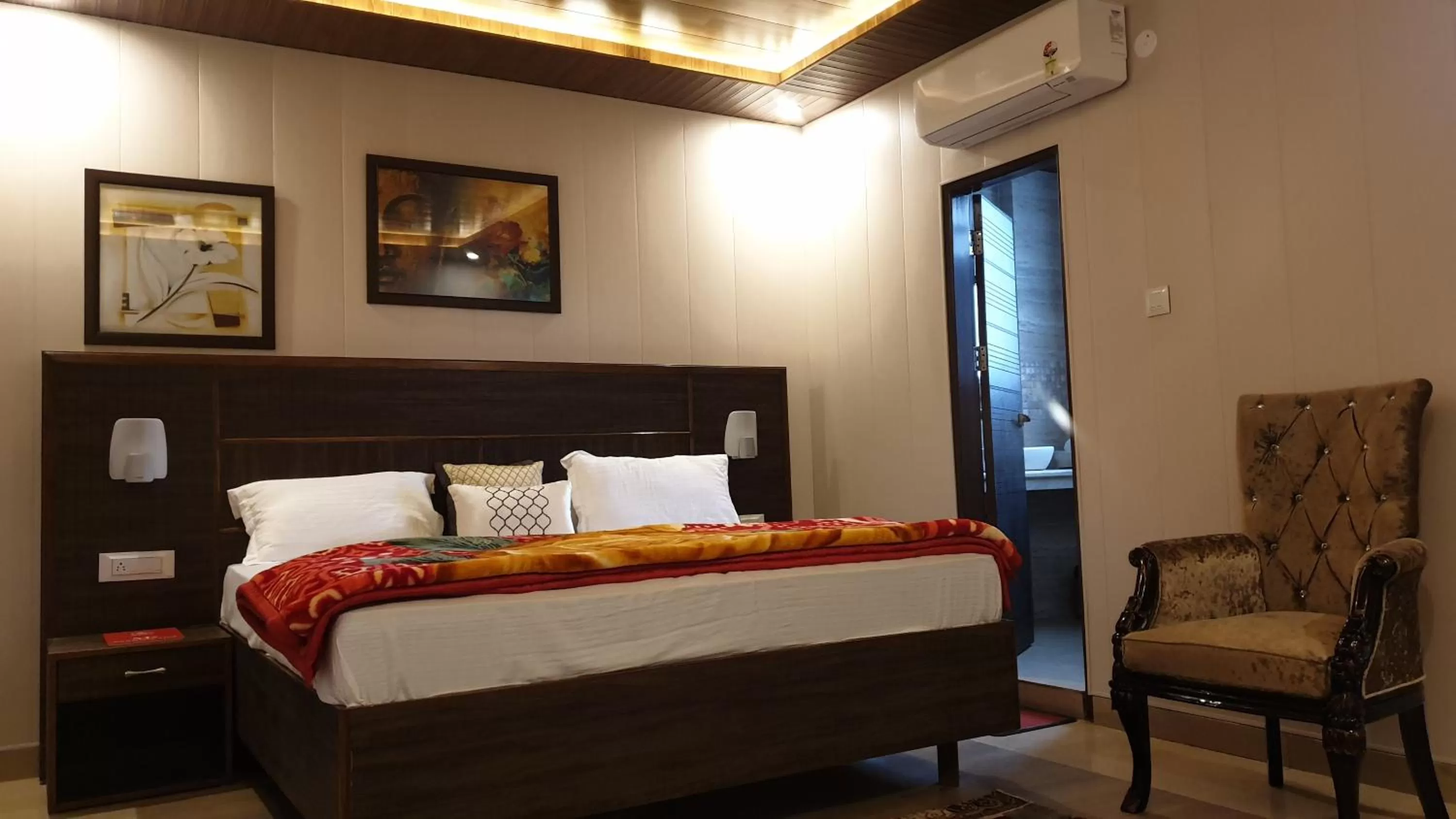 Bed in Maple Leaf Hotel