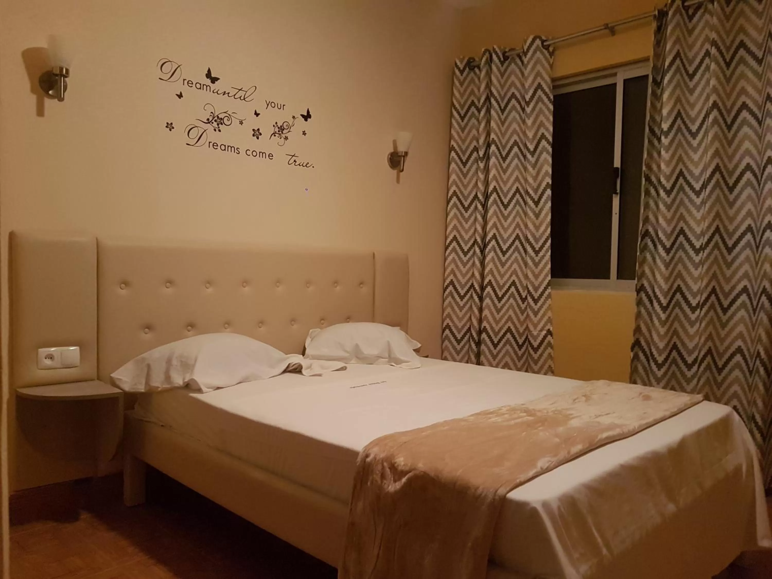 Bed in Pensão Asa Branca