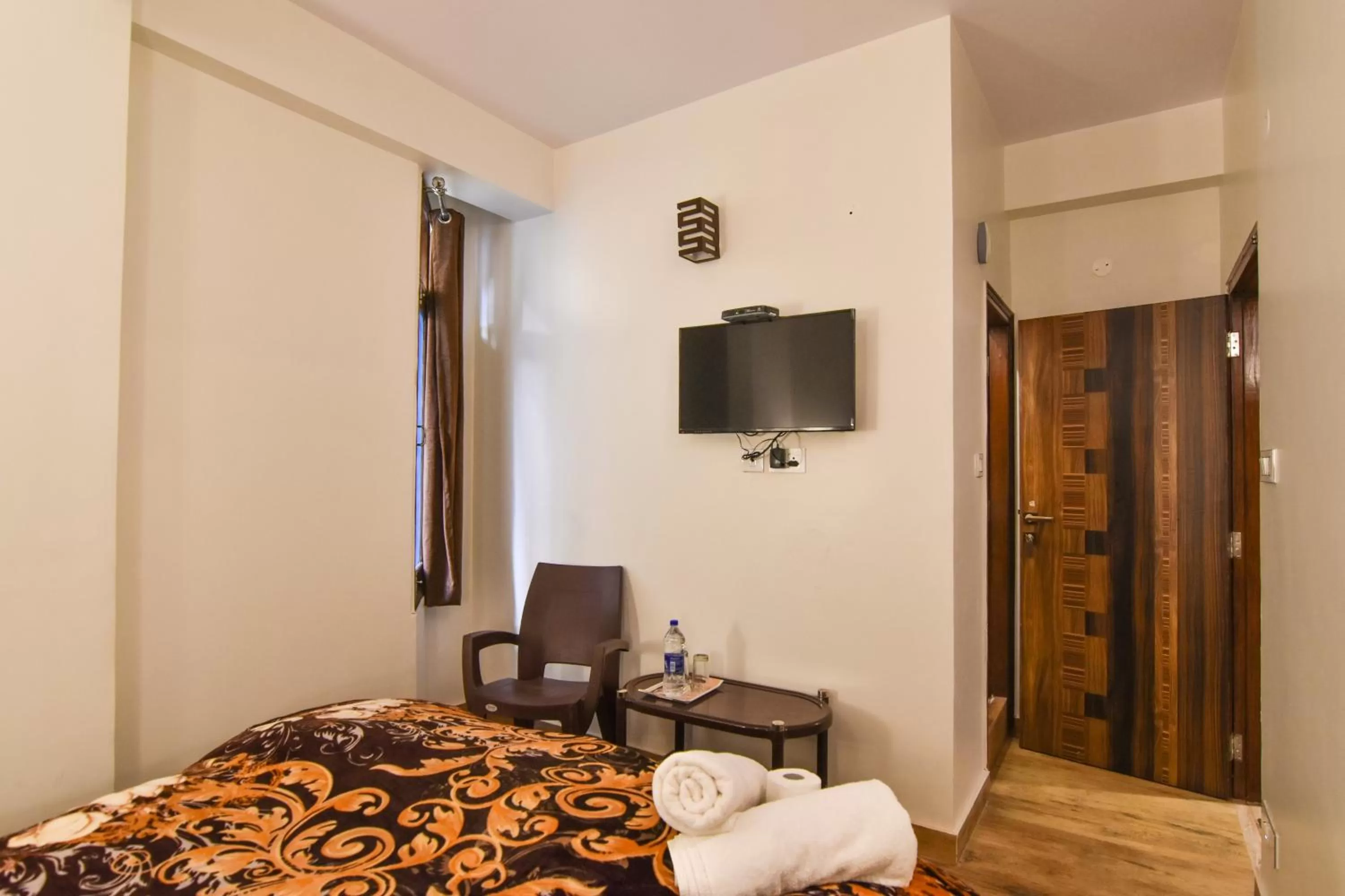 Bedroom, TV/Entertainment Center in Dhanlaxmi Apartments
