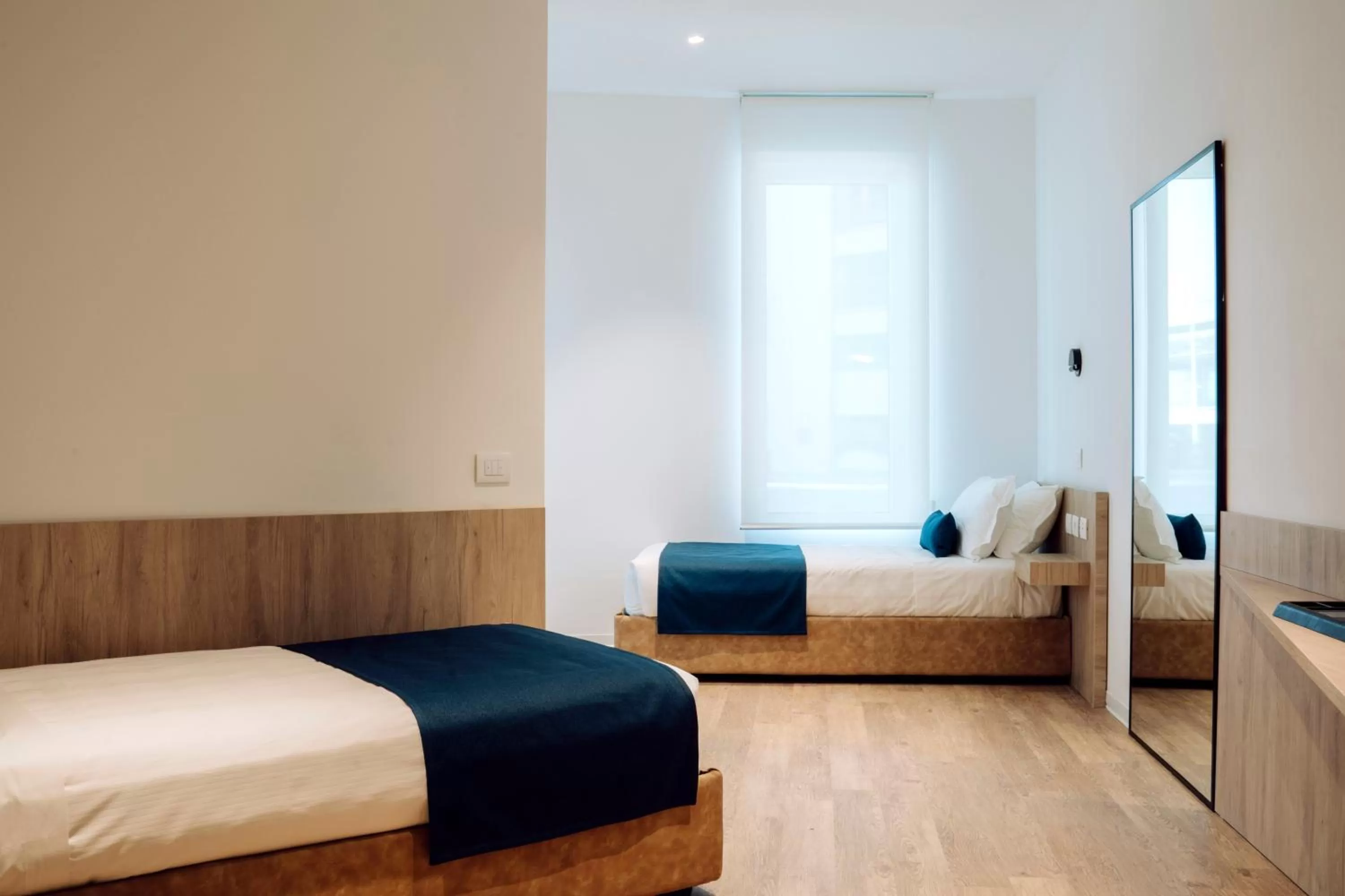 Photo of the whole room, Bed in Air Rooms Rome Airport by HelloSky