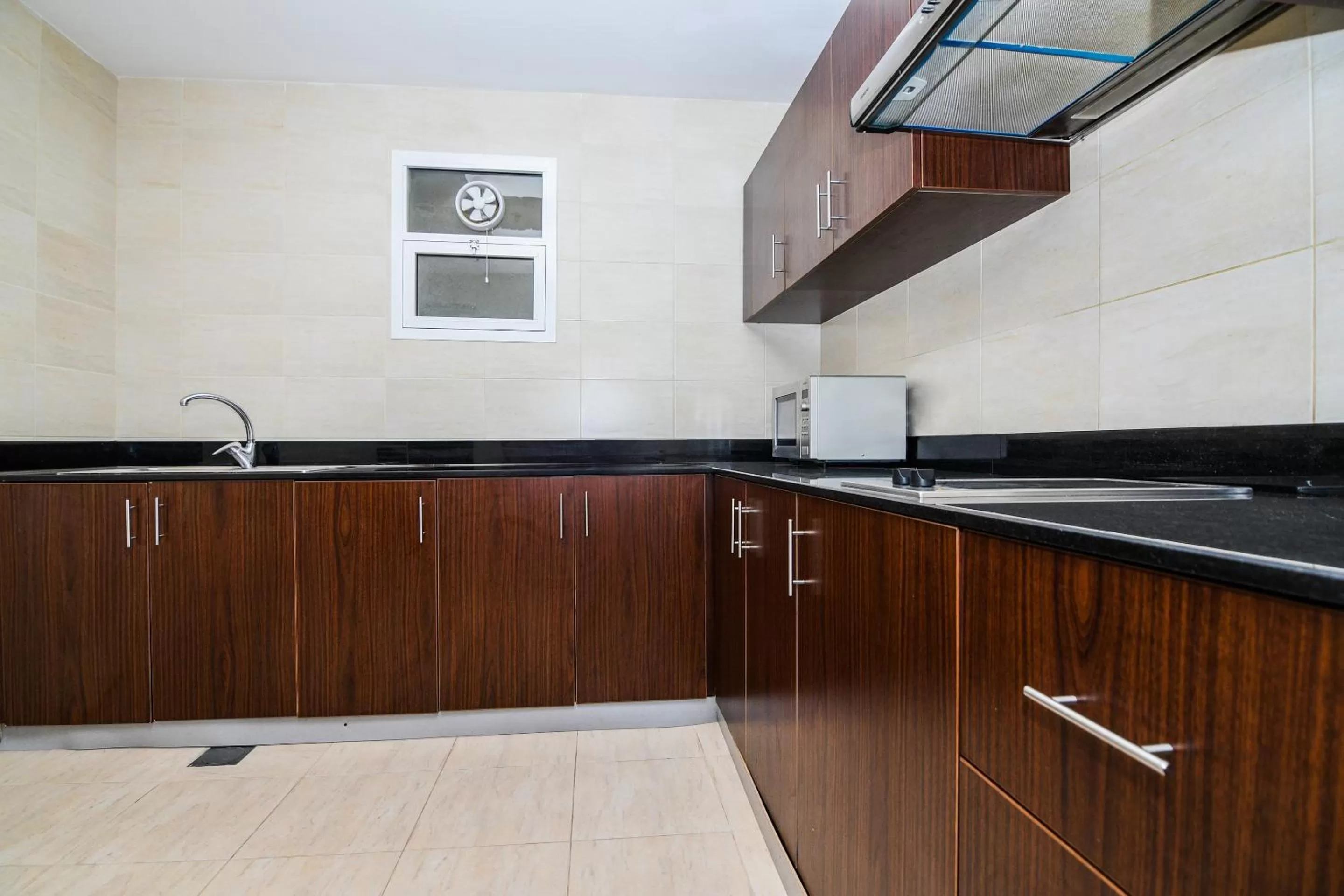 Kitchen or kitchenette in Action Hotel Ras Al Khaimah