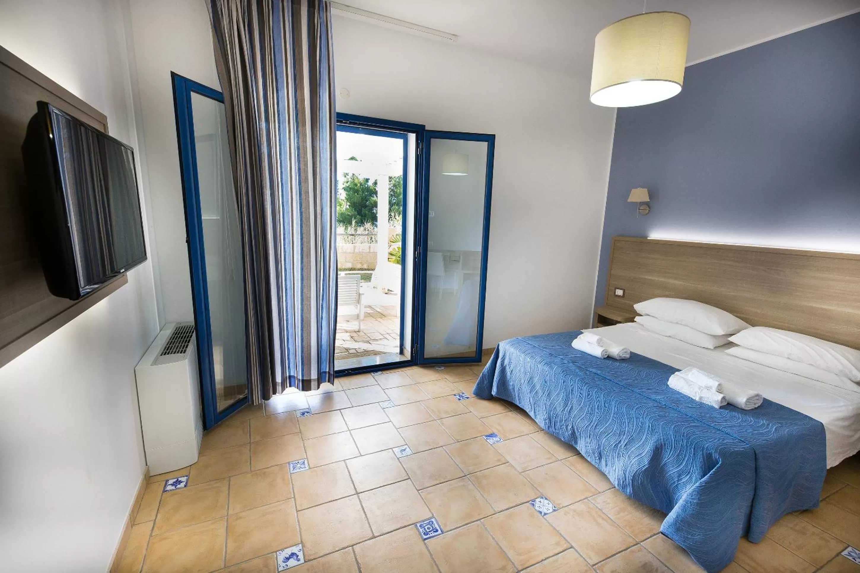 Patio, Bed in Petruso Resort