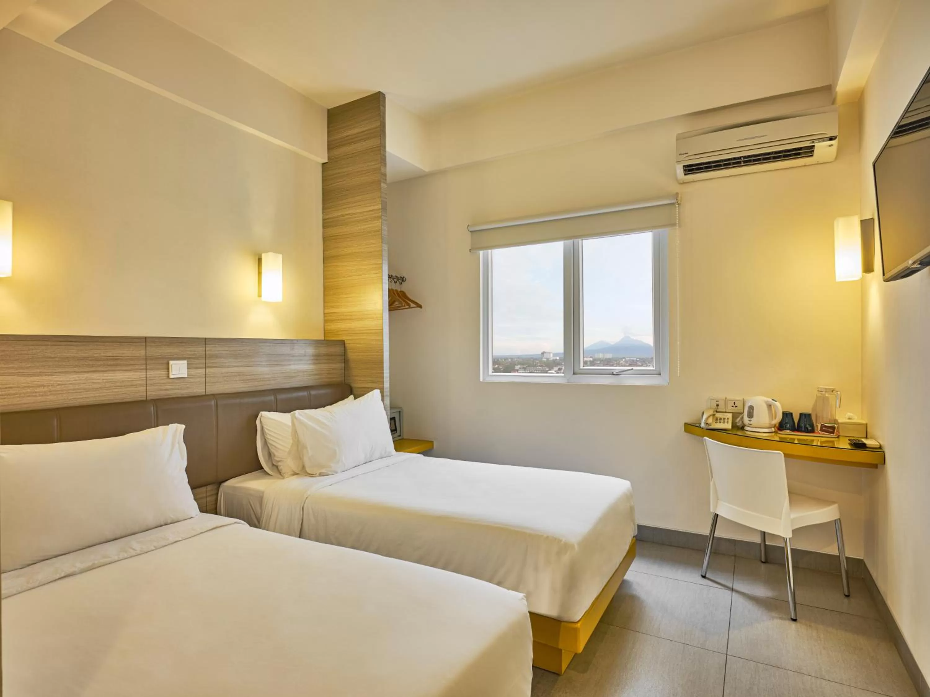 Bed in Carani Hotel Yogyakarta