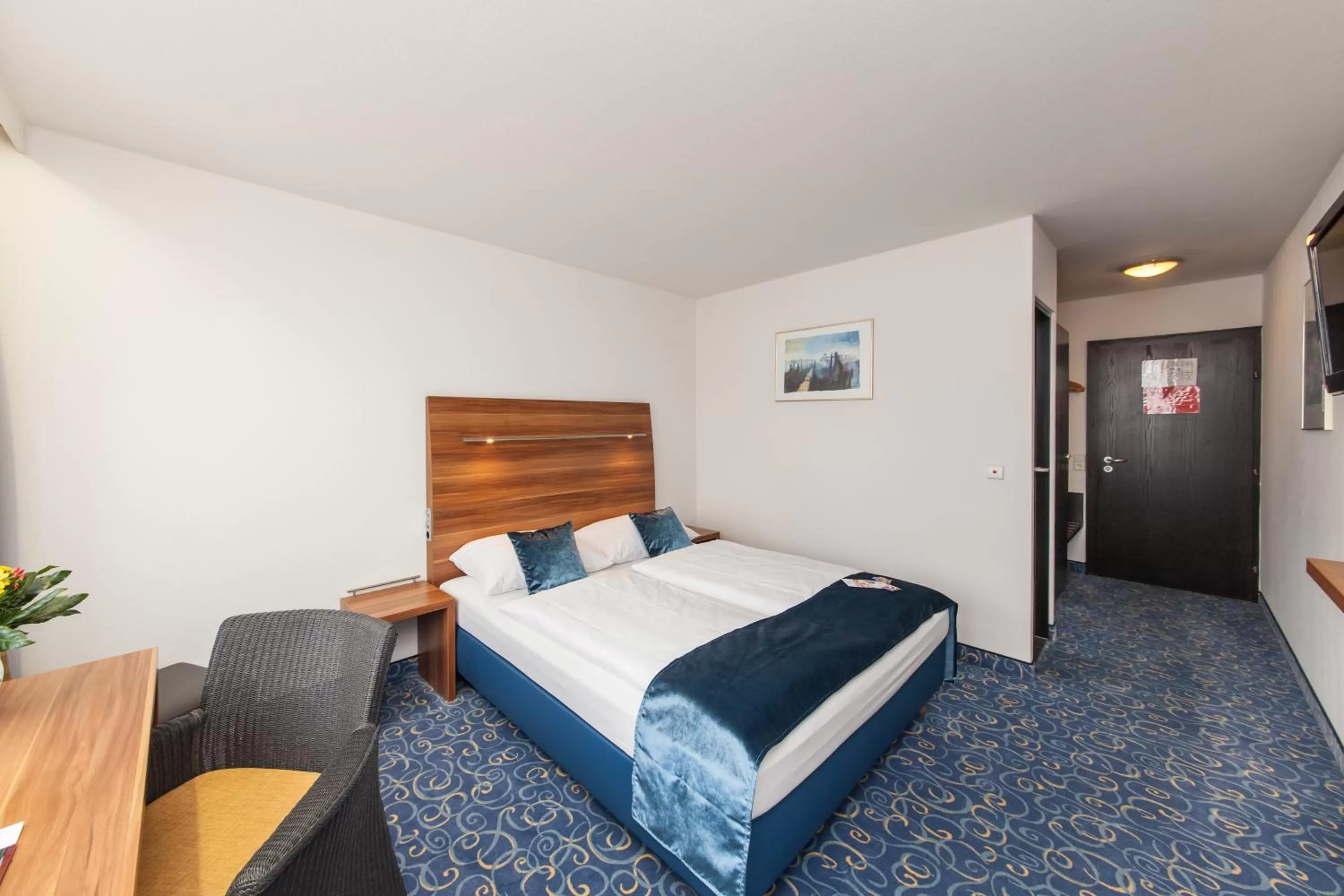 Photo of the whole room, Bed in Hotel Strohgäu