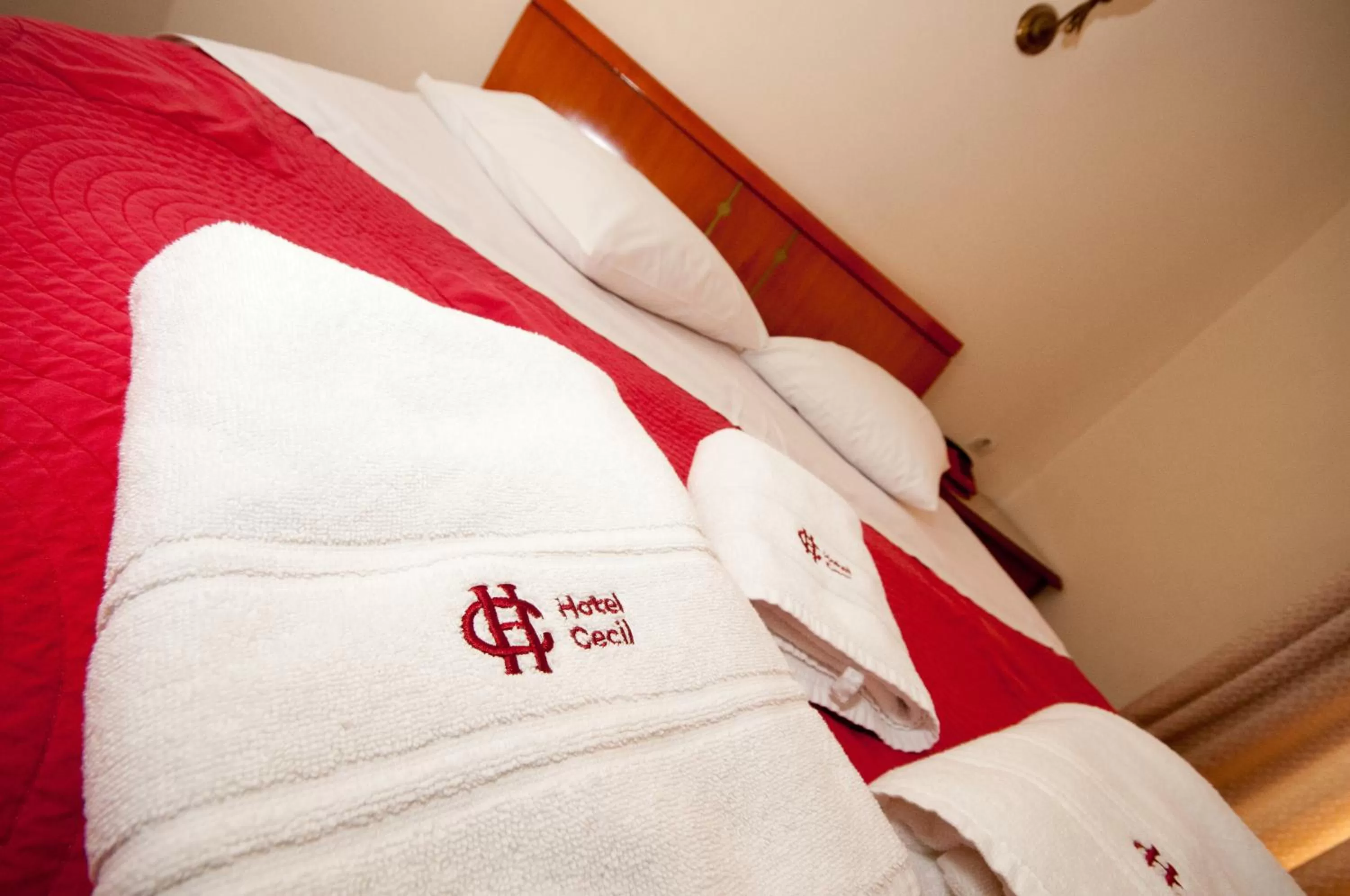 Property logo or sign, Bed in Cecil Hotel