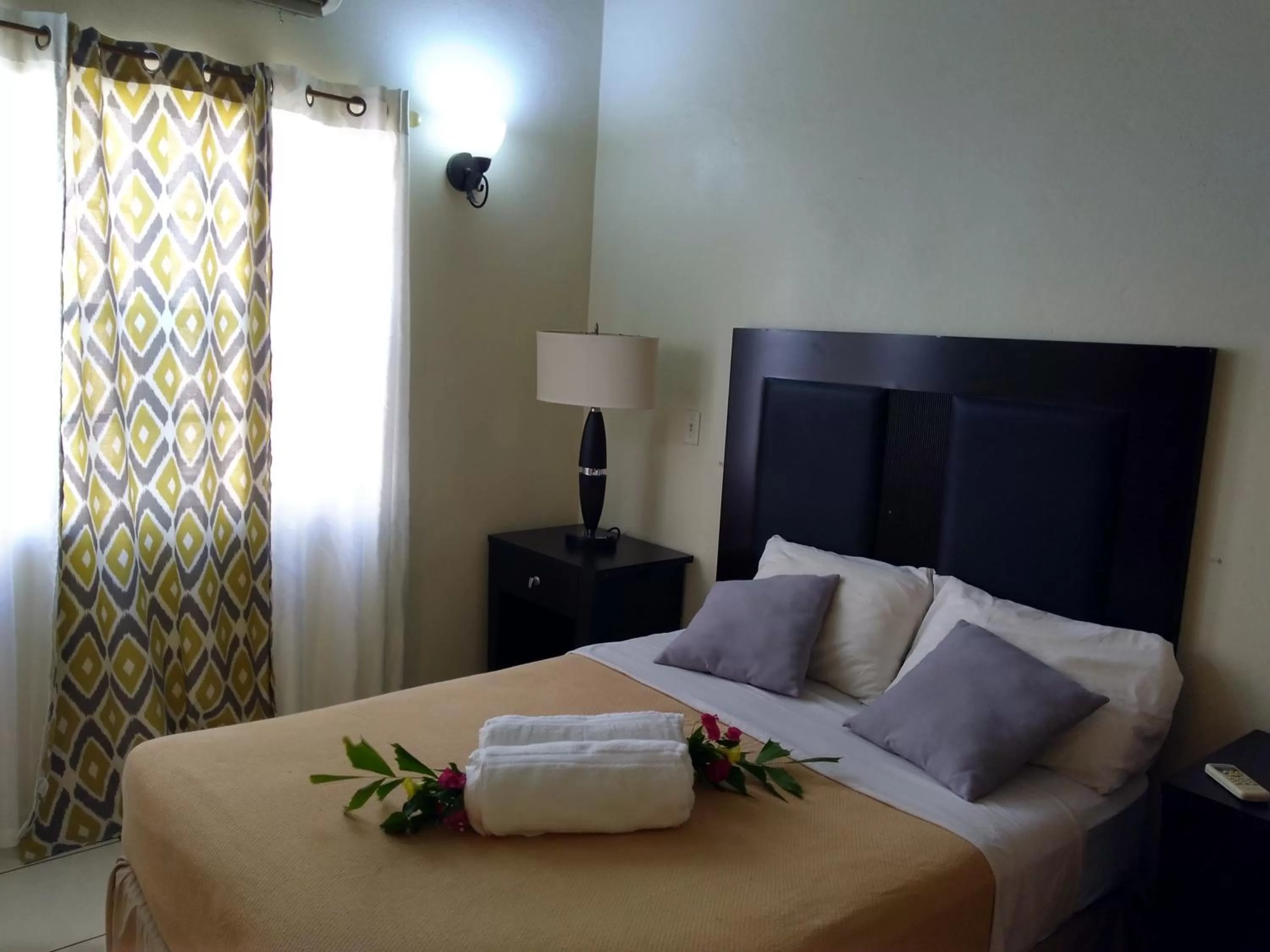 Bed in Connie's Comfort Suites